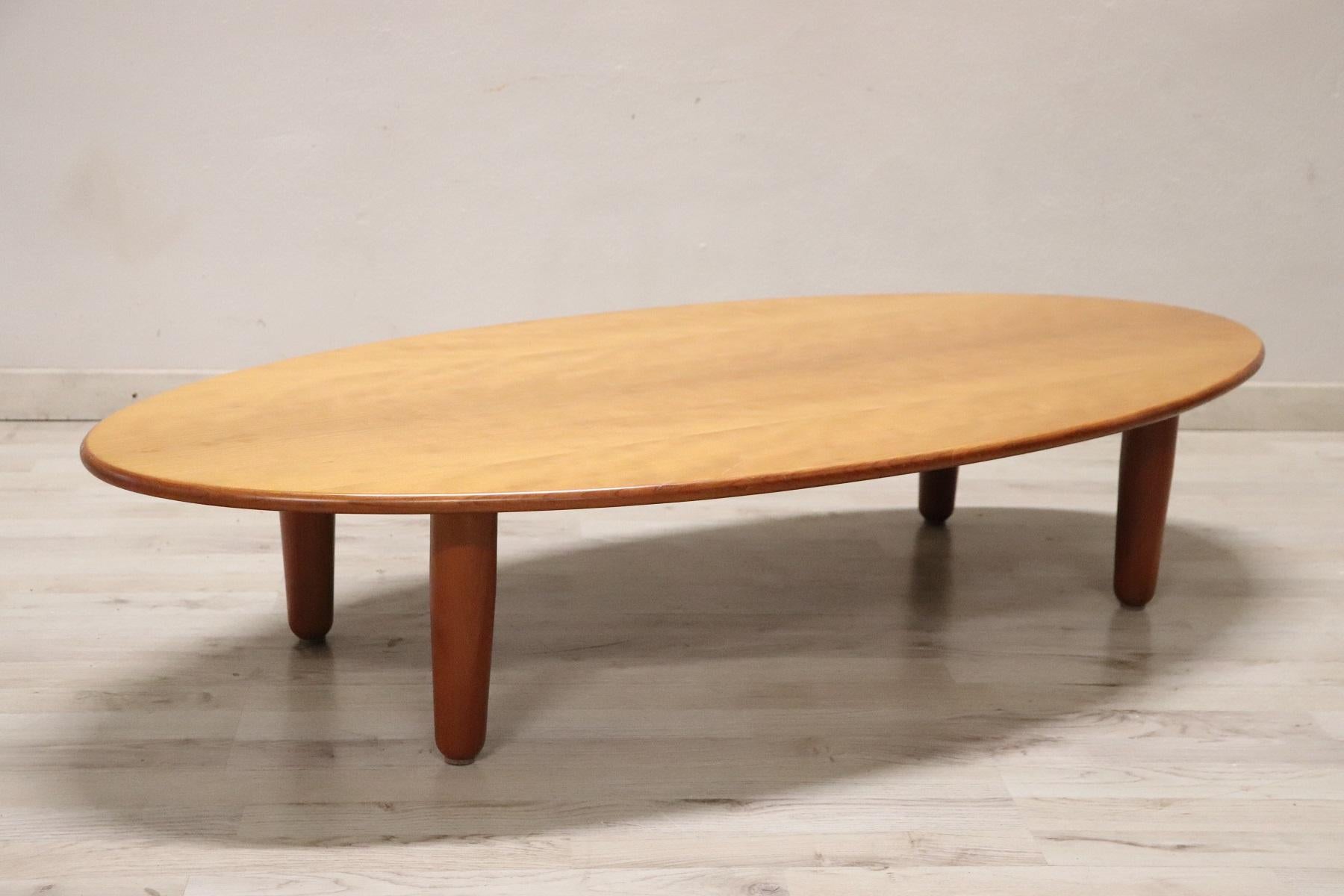 Rare and fine quality Italian design coffee table or sofa table by Cassina 1980s. The table is in precious ash wood. In perfect vintage conditions.