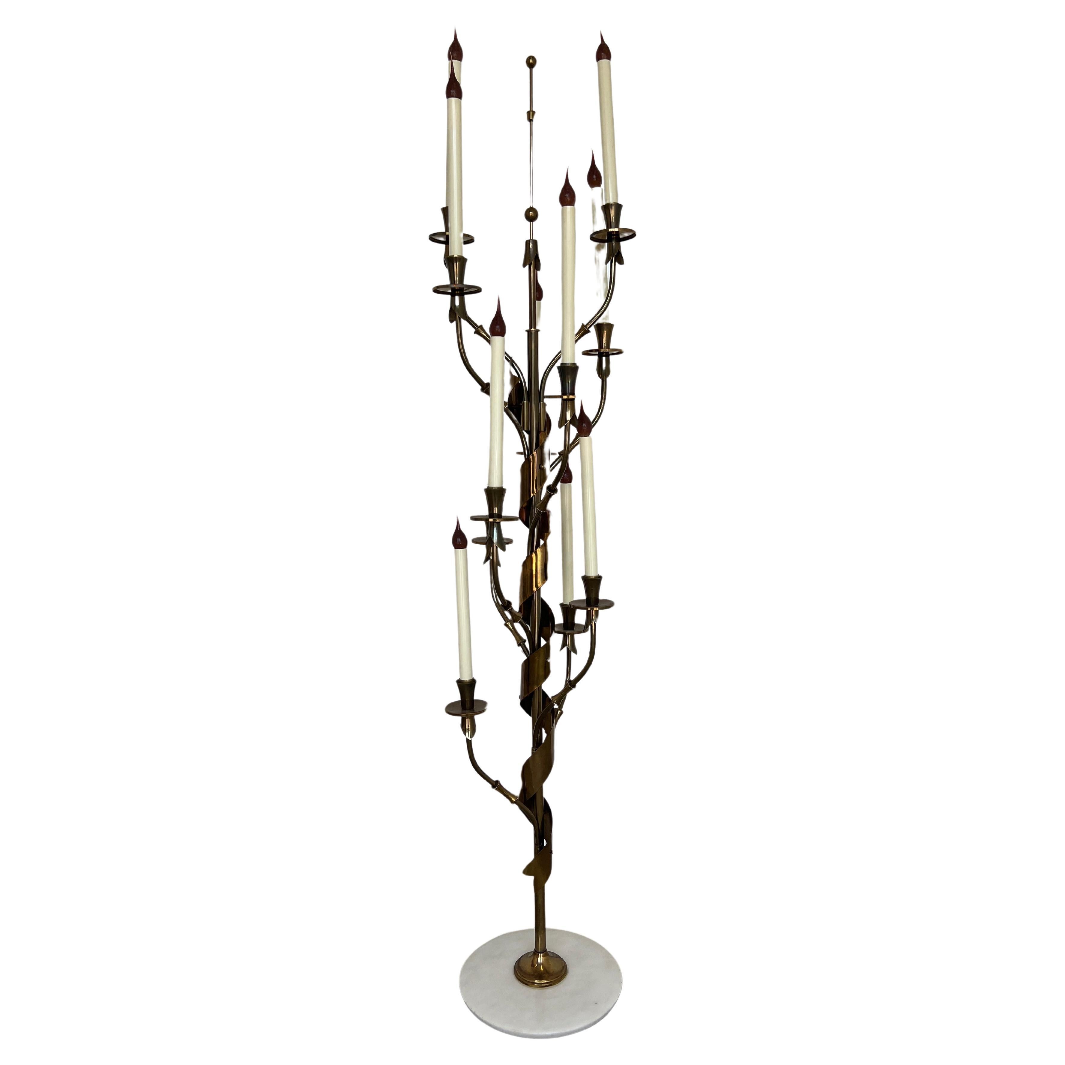Stilnovo (Italy, Founded 1946), circa 1960. 

Hollywood Regency in style, this 10 - Light Stilnovo floor lamp has an impressive scale measuring 66