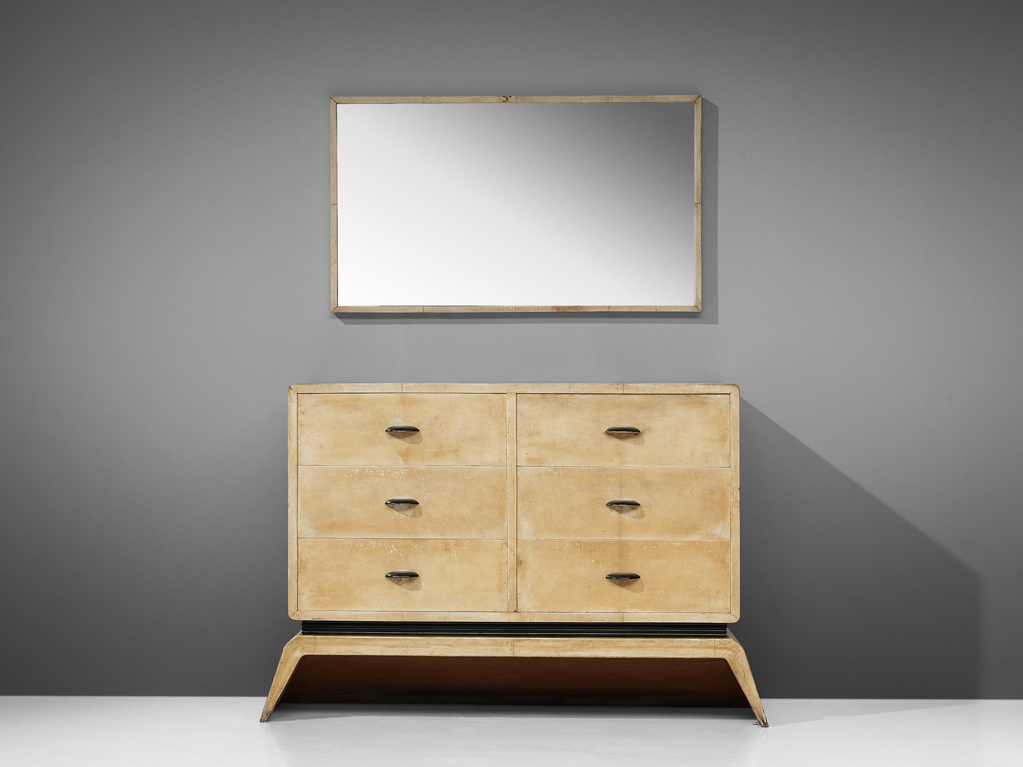Valzania, mirror, parchment, Italy, 1940s

Rare mirror by Valzania, from the 1940s. This mirror belongs to a Valzania sideboard. The rectangular frame of this mirror is fully covered in a light parchment with a beautiful patina. It is a beautiful