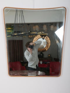 Rare Italian molded oak frame mirror with beveled mirror plate. c1950