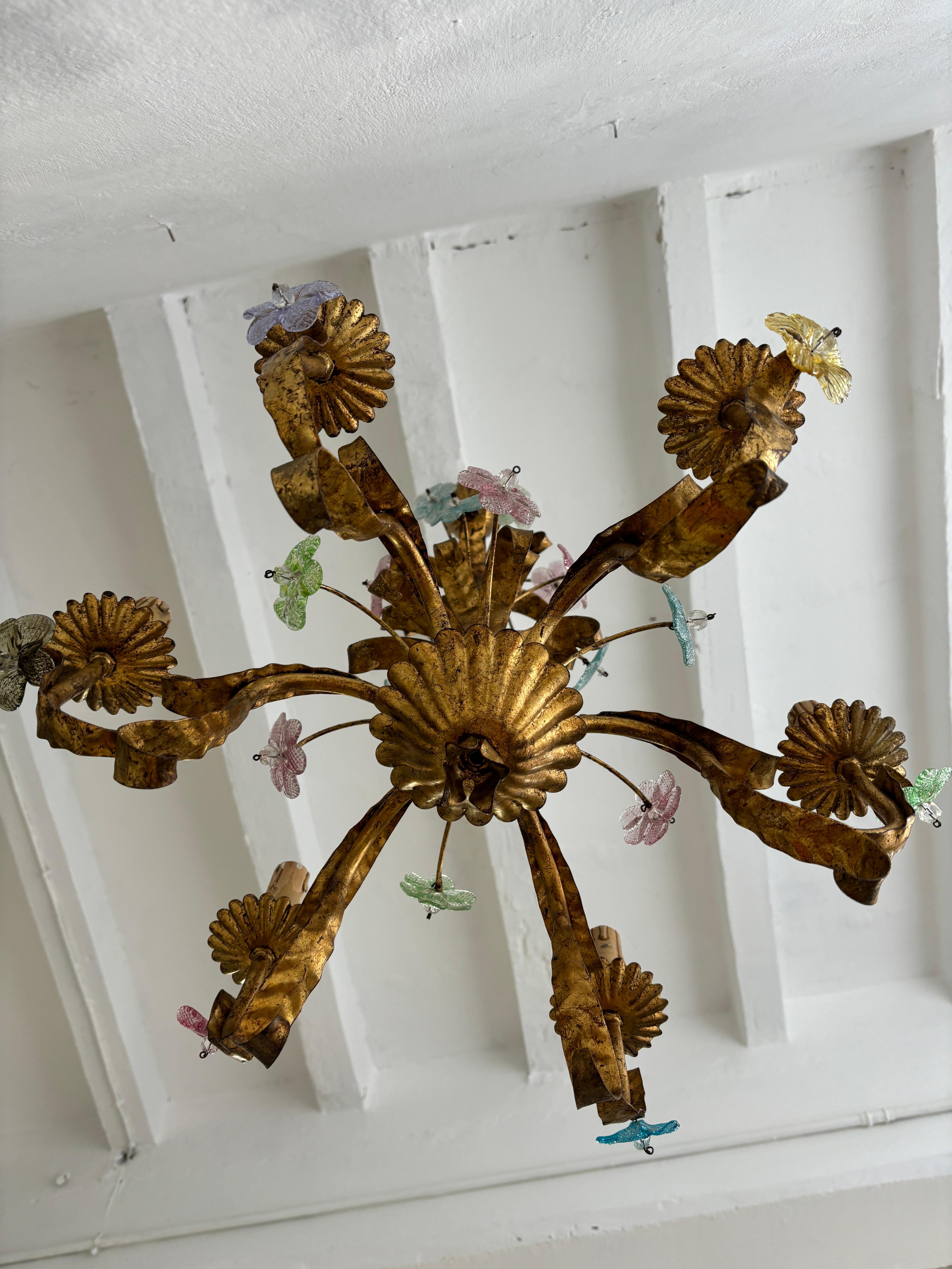 Housing 6-lights. Will be newly rewired with certified US UL sockets for the USA and appropriate sockets for all other countries and ready to hang. Oe of a kind!  Gilt tole with Murano glass flowers in all different colours. Adding 12 inches of