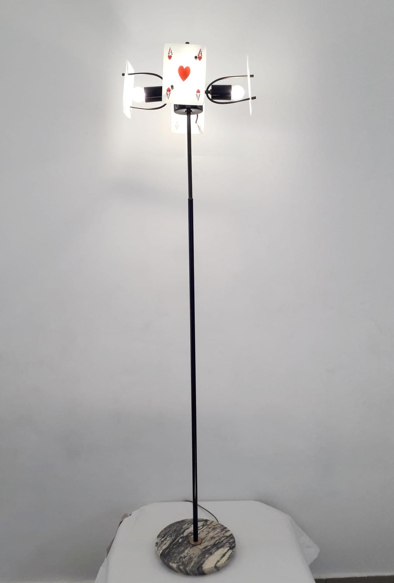 Rare vintage Italian midcentury floor lamp with 4 poker glass diffusers mounted on black metal frame and marble base, made in Italy, circa 1960s
Measures: Height 67 inches, top diameter 17 inches, marble base diameter 11 inches
4-light / E12 or E14
