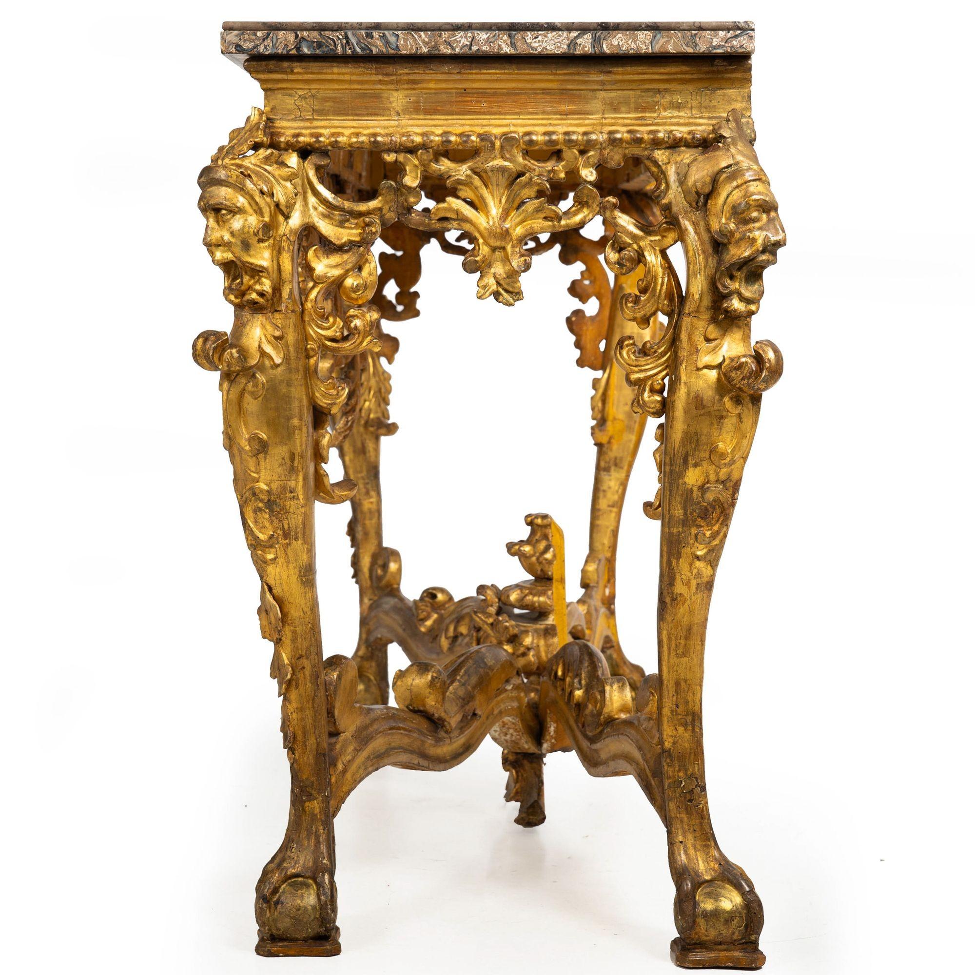 Carved Rare Italian Rococo Giltwood Fossilized Marble Console Table ca. 1750 For Sale