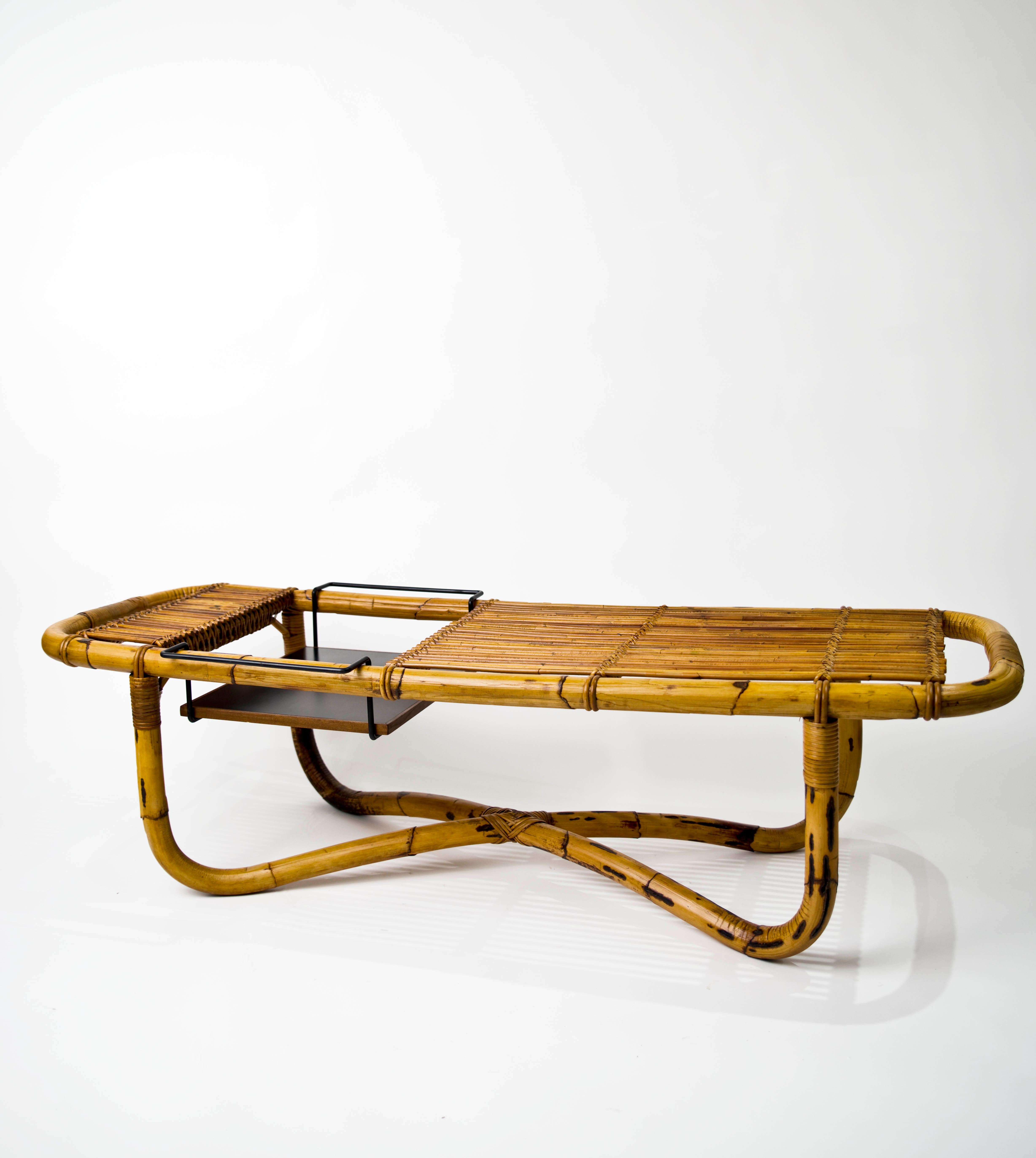 Equipped low coffee table model Bt1. Indian cane, wicker, enameled metal, formica. Italy in the 1960s  by Tito Agnoli