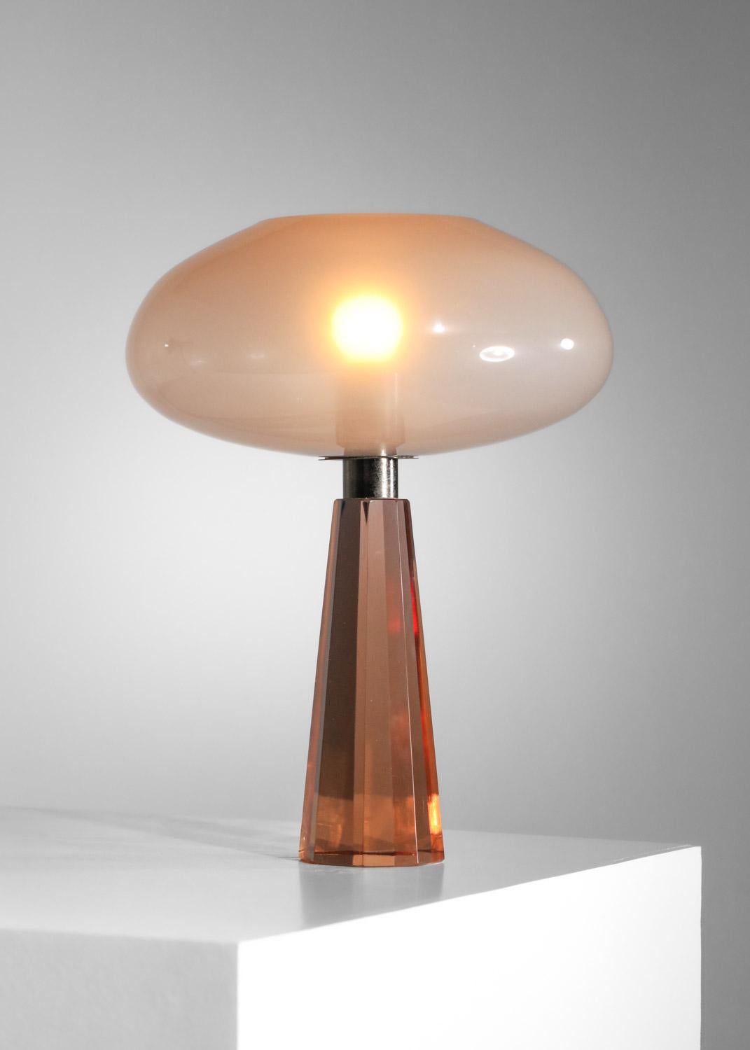 Table lamp from the 60s attributed to Italian designer Flavio Poli for Seguso. Faceted pyramid base in thick orange Murano glass, oval white glass shade. Original, highly decorative design. Beautiful vintage condition, with traces of age and