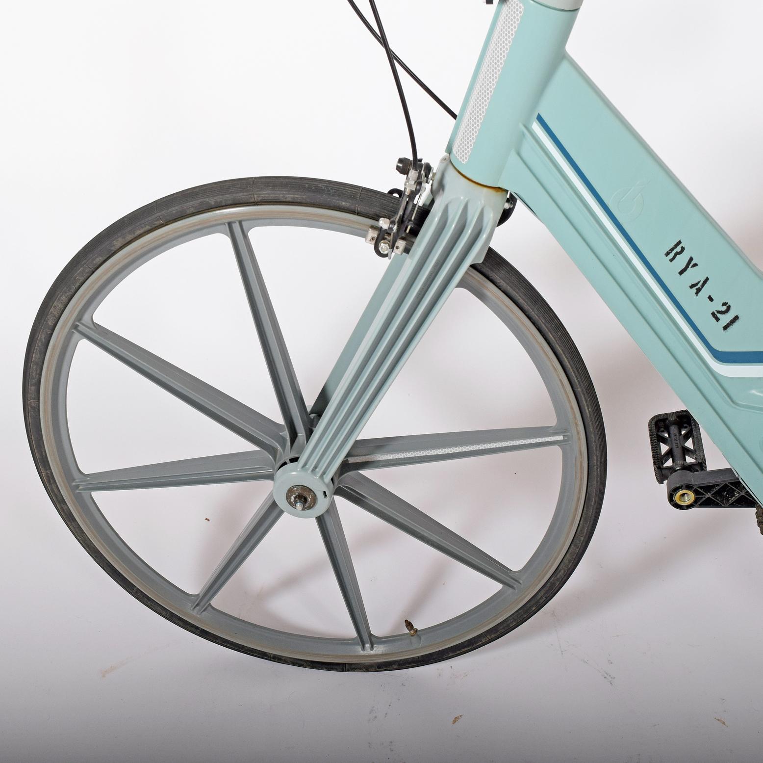 In response to the 1974 oil crisis, a small group of Swedish engineers obtained government funding to develop a bicycle completely composed of fiber-reinforced composite plastics (FRP). By 1980, the Itera Development Center AB was designing,