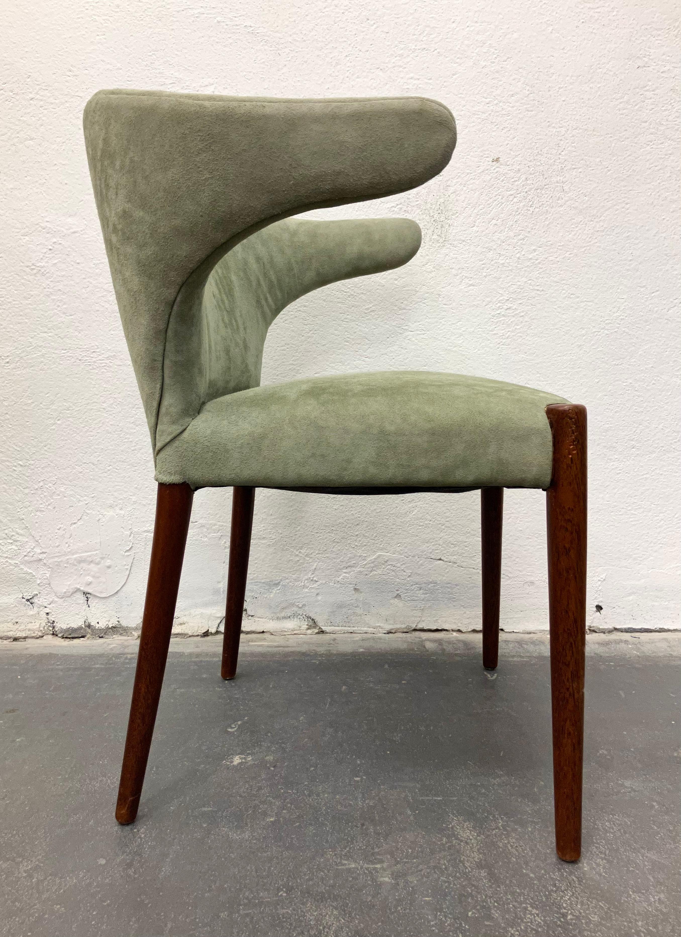 A very rare and unusual design by master cabinet maker and furniture designer Jacob Kjaer. The seat and backrest are fully upholstered in a sea-green suede, with solid teak legs. Only a few examples of this design have come to market as it was