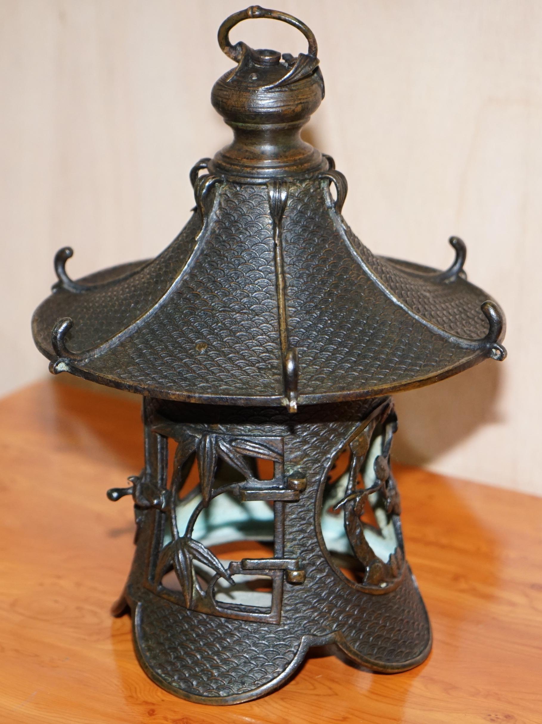 Hand-Crafted Rare Japanese Bronze circa 1930 Hanging Lantern Decorated with Floral Scenes