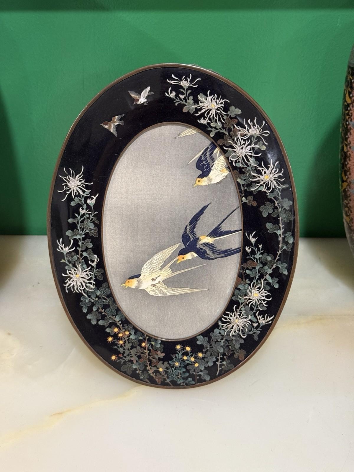 Rare Japanese Cloisonné Oval Frame with Birds & Chrysanthemums, in the Manner of Hayashi


An exceptionally rare Japanese cloisonné enamel picture frame of oval form, worked in the manner of Hayashi Kodenji, dating to the Meiji period. The frame is