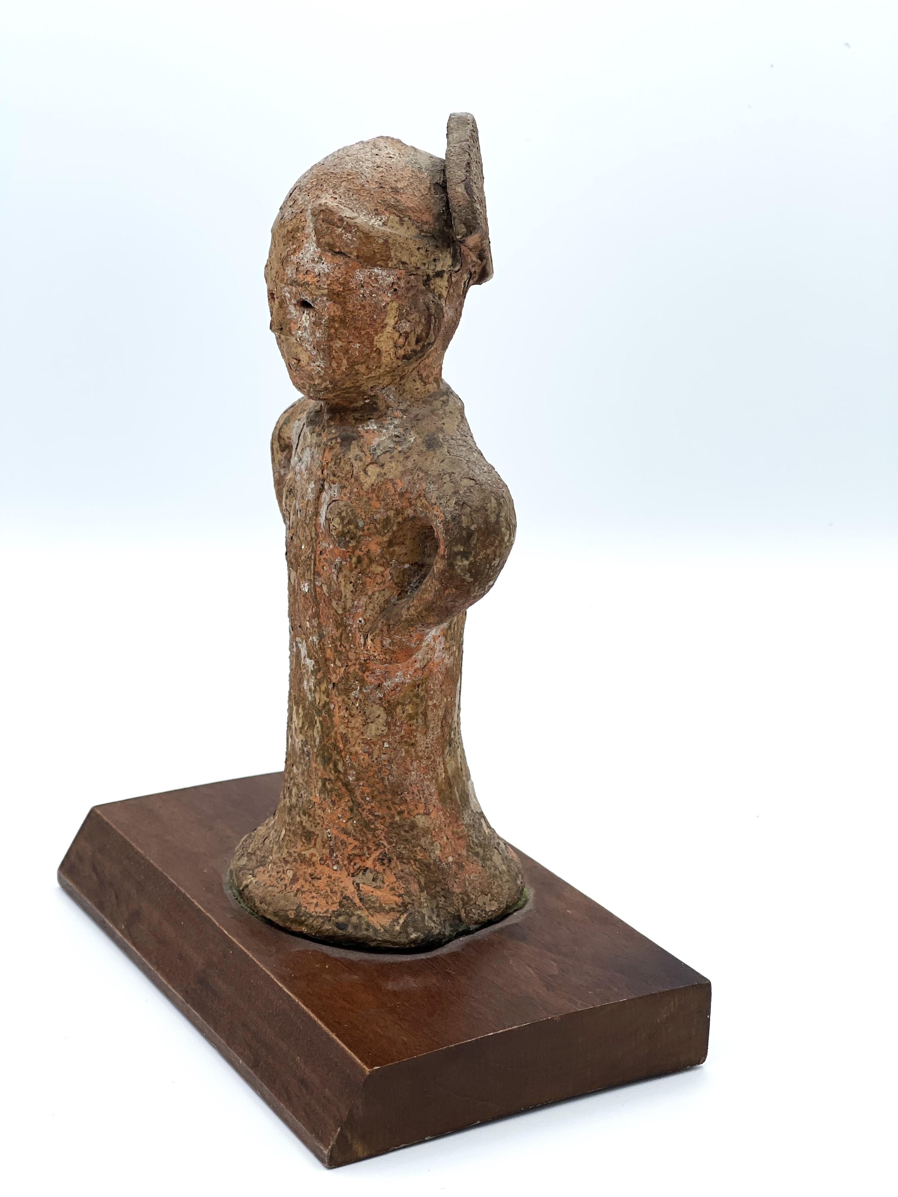 Rare Japanese Complete Figure of an Aristocratic Woman Haniwa, 6th Century AD

DIMENSIONS
Height: 8.5 inches
Width: 6 inches
Depth: 4 inches (base)

ABOUNT
A remarkably well-preserved and rare example of an early Japanese haniwa sculpture, this
