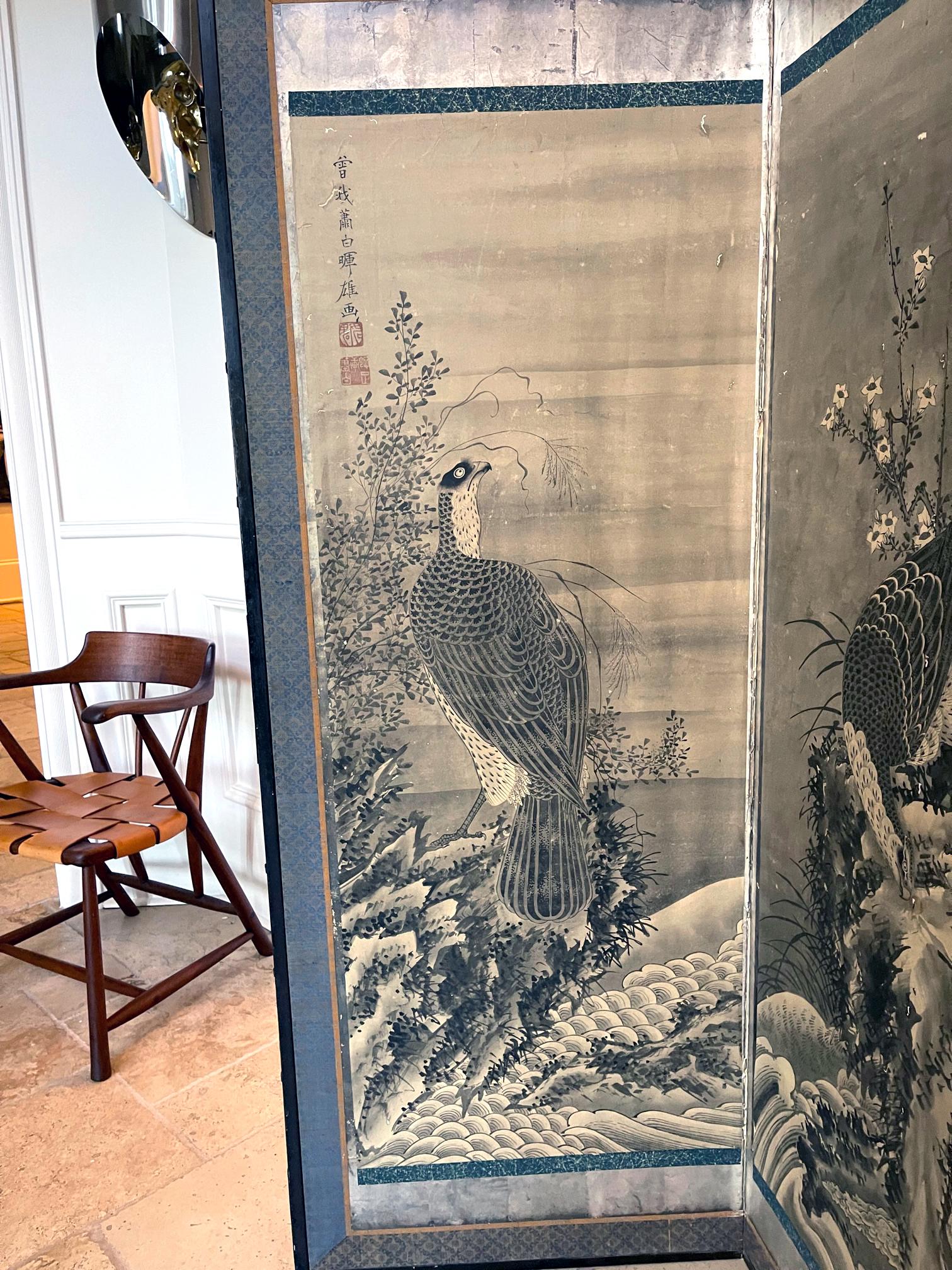 A rare six-panel Japanese folding floor screen (Byōbu) by Soga Shōhaku (1730-1781) from Edo period. The screen depicts six perched hawk-eagles in various poses positioned in a literary landscape composed of plants, flowers, trees, rocks and all