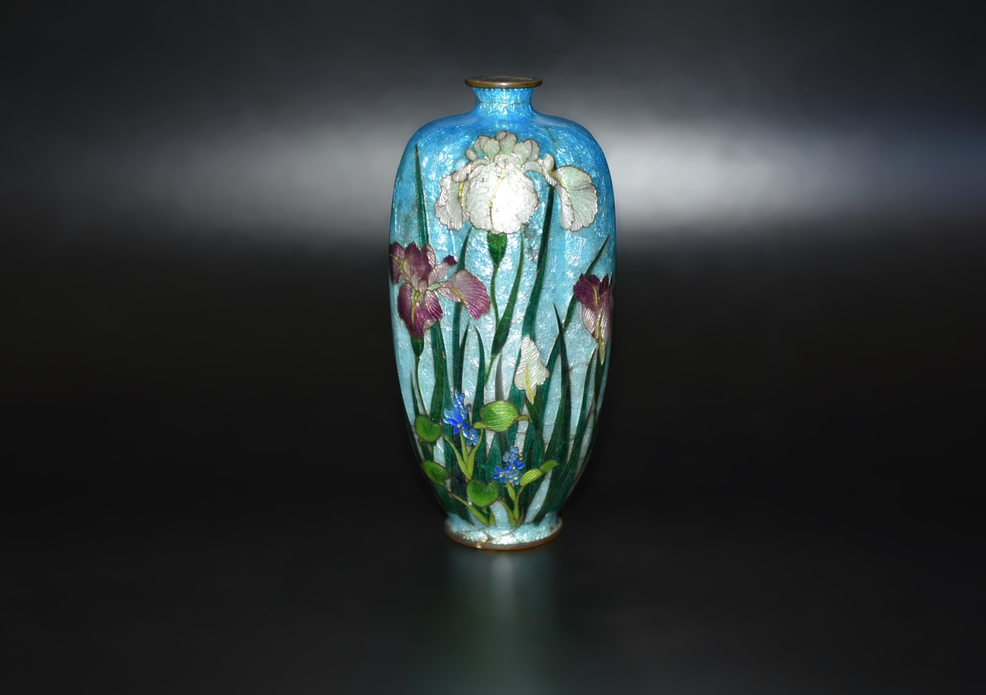 A rare early Ginbari cloisonne work by renowned Meiji master Kumeno Teitaro. In high-shouldered ovoid form with six lobes in the body, which forms the shape of a sakura - cherry blossom. Symbols of purity and hope, a stand of purple and white