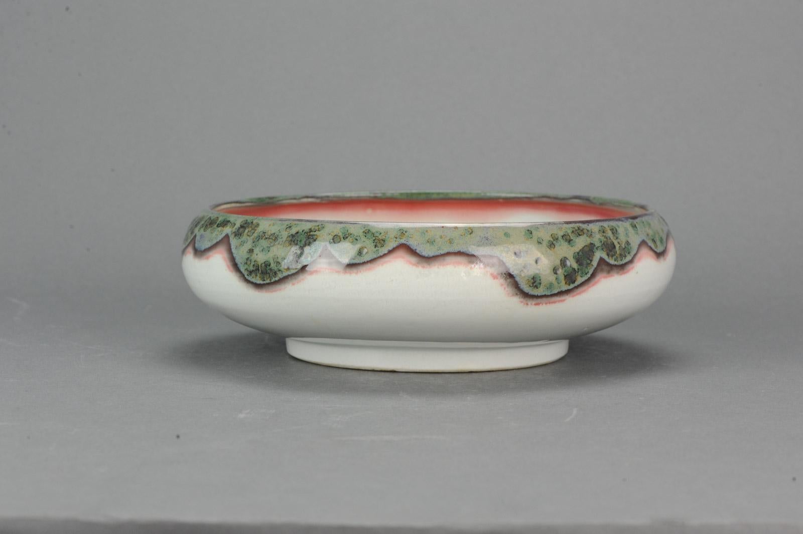 Here we have a very nice and delicate Large Japanese porcelain Bowl or Serving Dish with very nice and uncommon colors. In perfect condition.

Additional information:
Material: Porcelain & Pottery
Region of Origin: Japan
Period: ca 1900 Showa