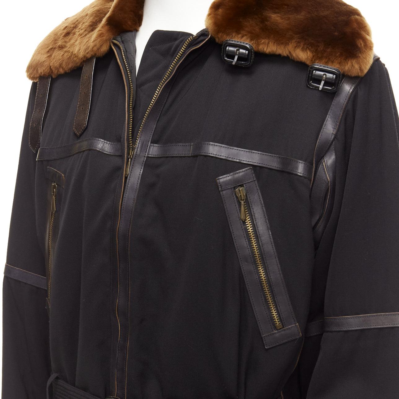 rare JEAN PAUL GAULTIER HOMME black wool brown faux fur aviator flight jacket IT50 L
Reference: TGAS/D01162
Brand: Jean Paul Gaultier
Designer: Jean Paul Gaultier
Collection: HOMME
Material: Wool, Blend, Leather
Color: Black, Brown
Pattern: