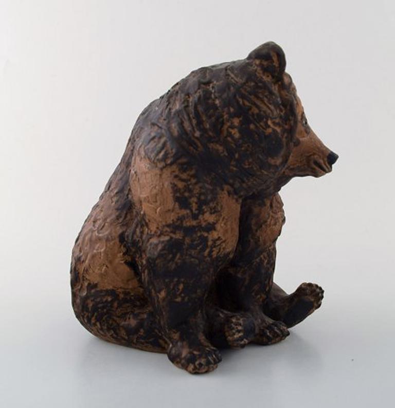 Rare Jeanne Grut for Royal Copenhagen Aluminia Faience. Sitting bear. Model Number 3823.
In very good condition.
Signed: JG, Royal Copenhagen
Measures: 19 cm x 19 cm.