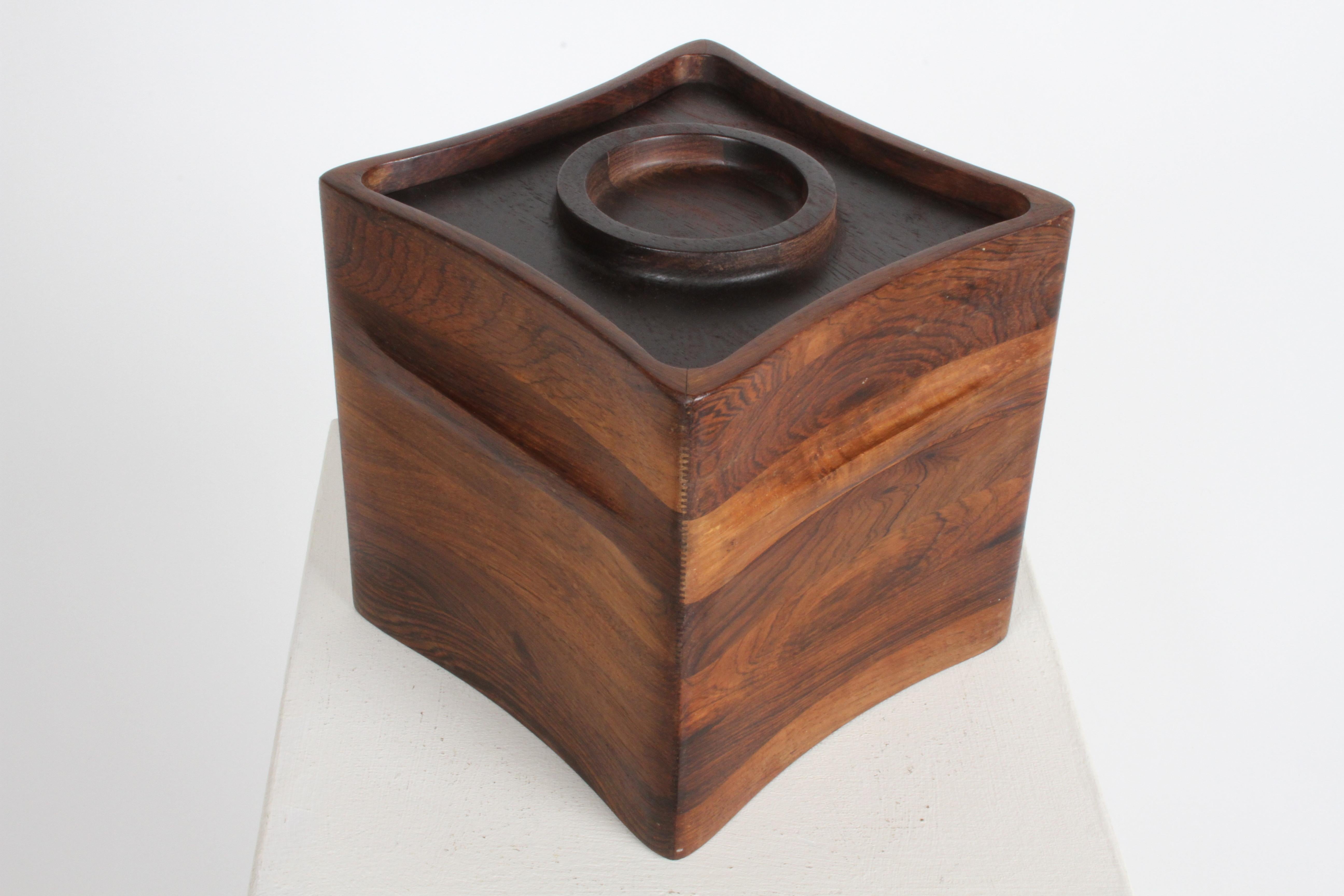 Rare Danish Modern Rosewood Ice Bucket designed by the Jens Harald Quistgaard for Dansk Designs, Denmark in the 1960's for his 'Rare Woods’ Limited Edition collection. Scandinavian Modern at its best, with sculpted sides, integrated handles on all