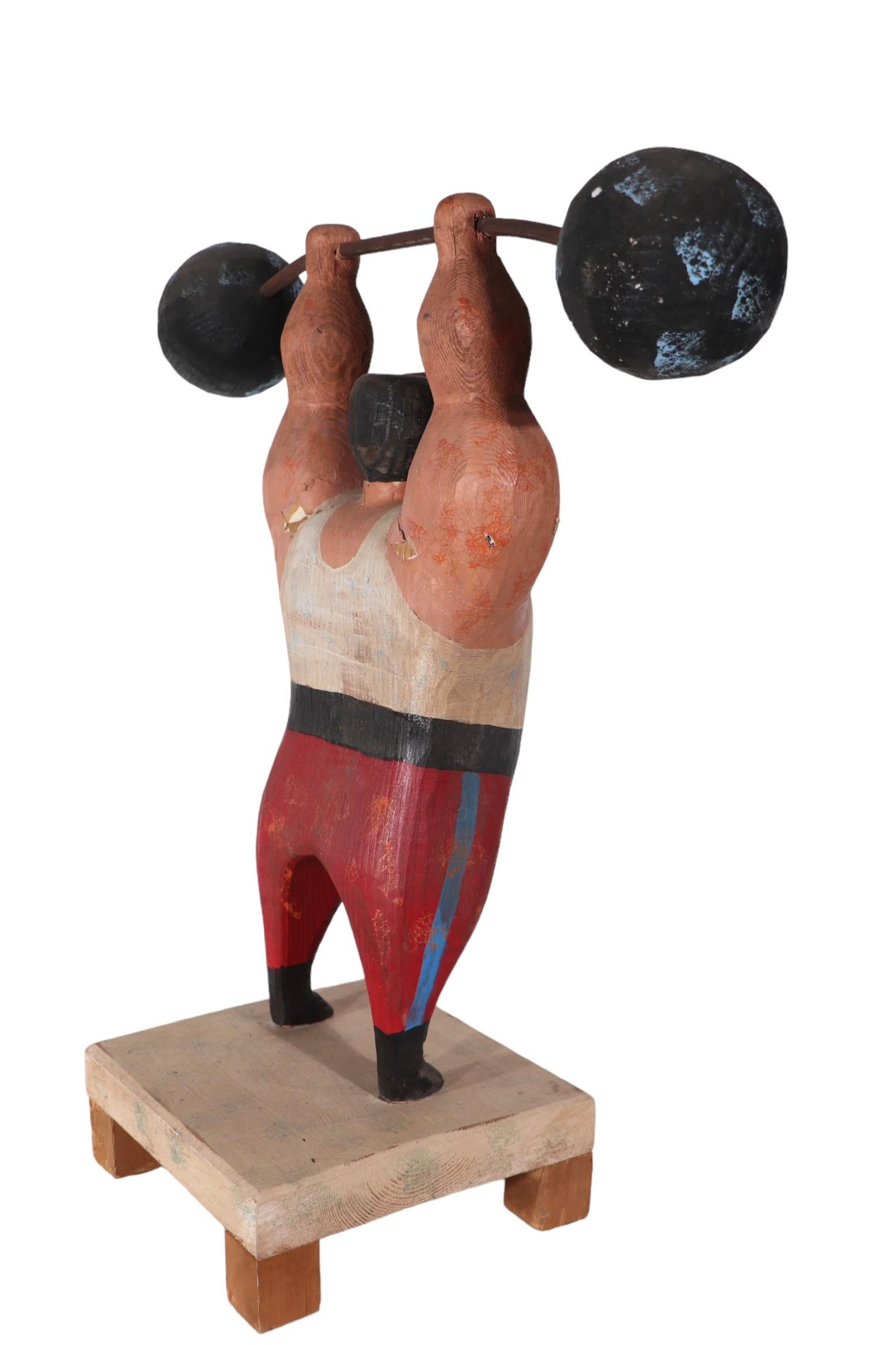 Rare Jere Wood Sculpture of Weightlifter signed C.Jere  and dated 1982 In Good Condition In New York, NY