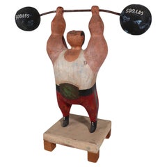 Rare Jere Wood Sculpture of Weightlifter signed C.Jere and dated 1982