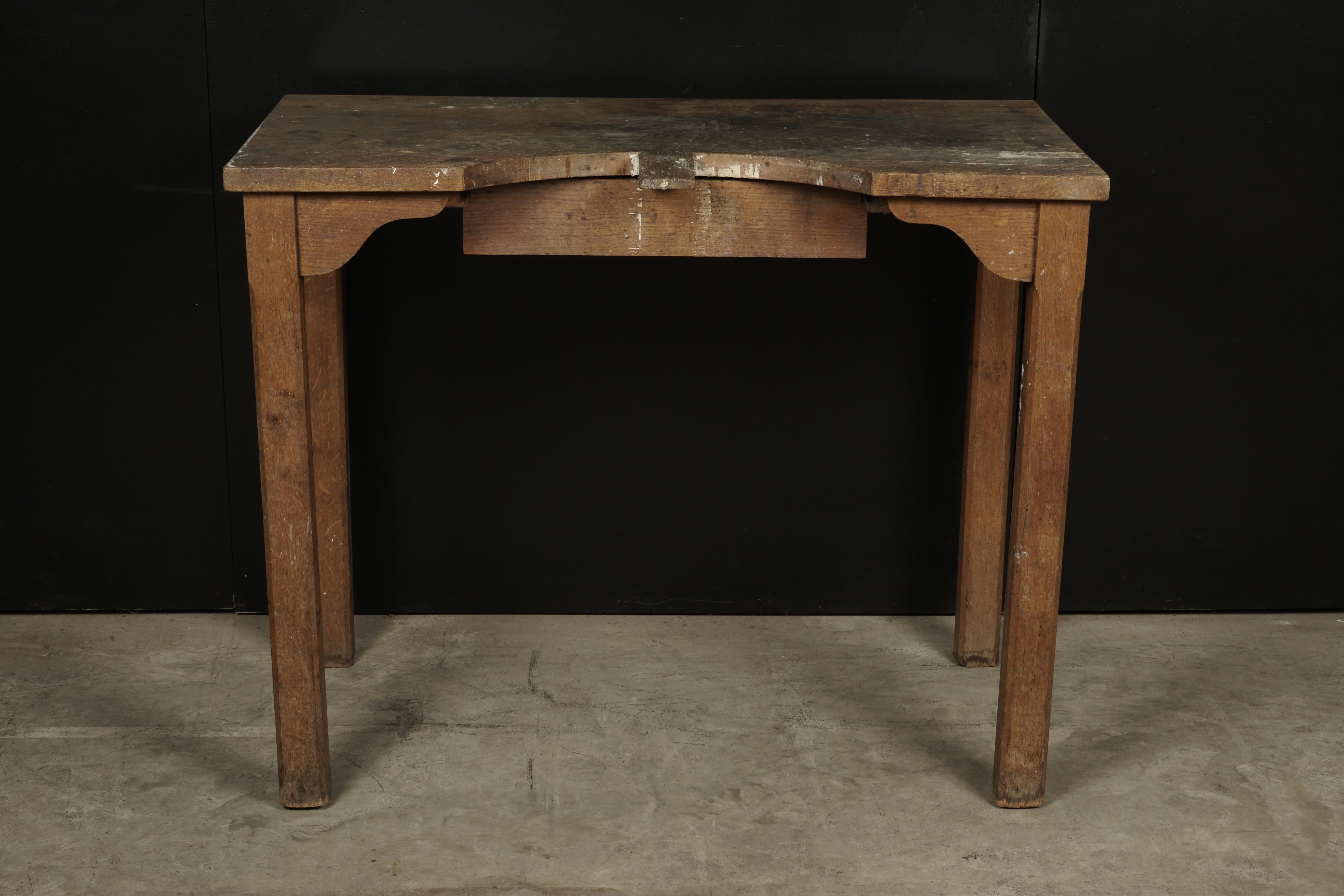 Vintage console table from a jewelers shop, France, circa 1940. Great color and patina. One drawer.