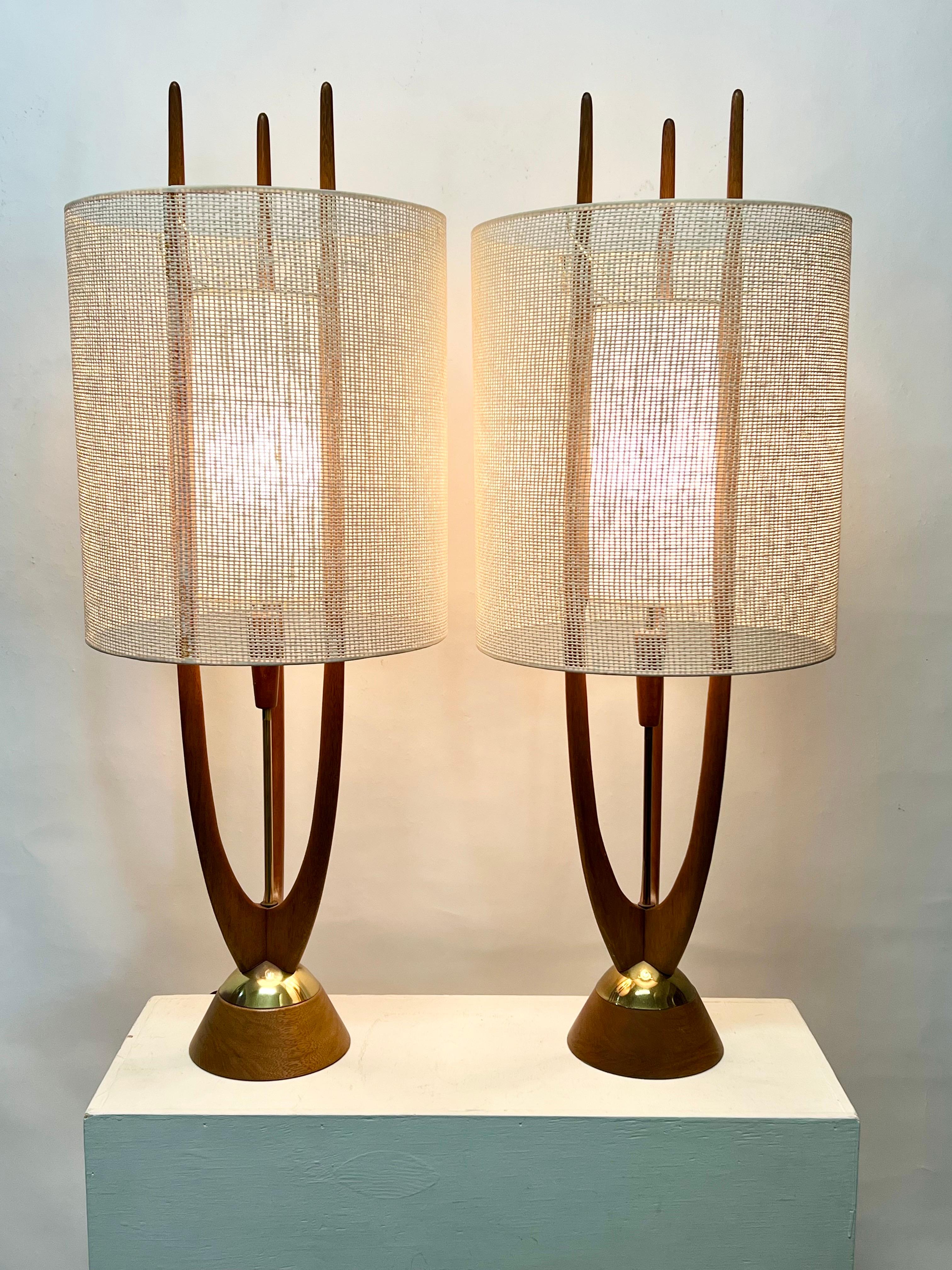 Fantastic pair of rare table lamps by American designer, John Keal c1960s. All original condition, wonderful patina, with original shades. Typically the original outer shades are missing from these lamps. They can be used with or without the outer
