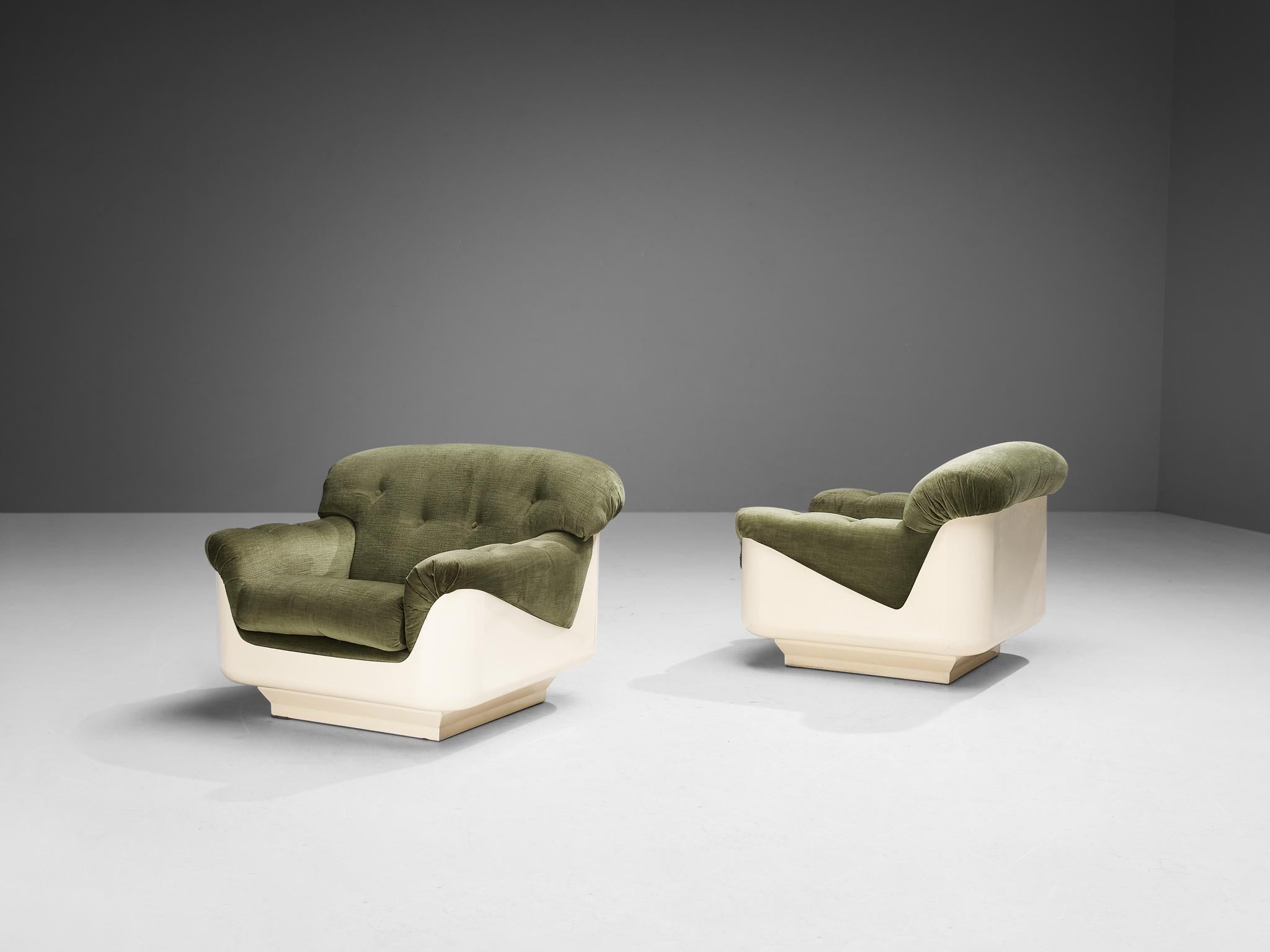 Jorge Zalszupin, pair of lounge chairs, fiberglass, velvet, Brazil, 1960s

This rare design by Brazilian master Jorge Zalszupin put emphasize on combining functionality with an aesthetically pleasing layout for daily use. This particular model in