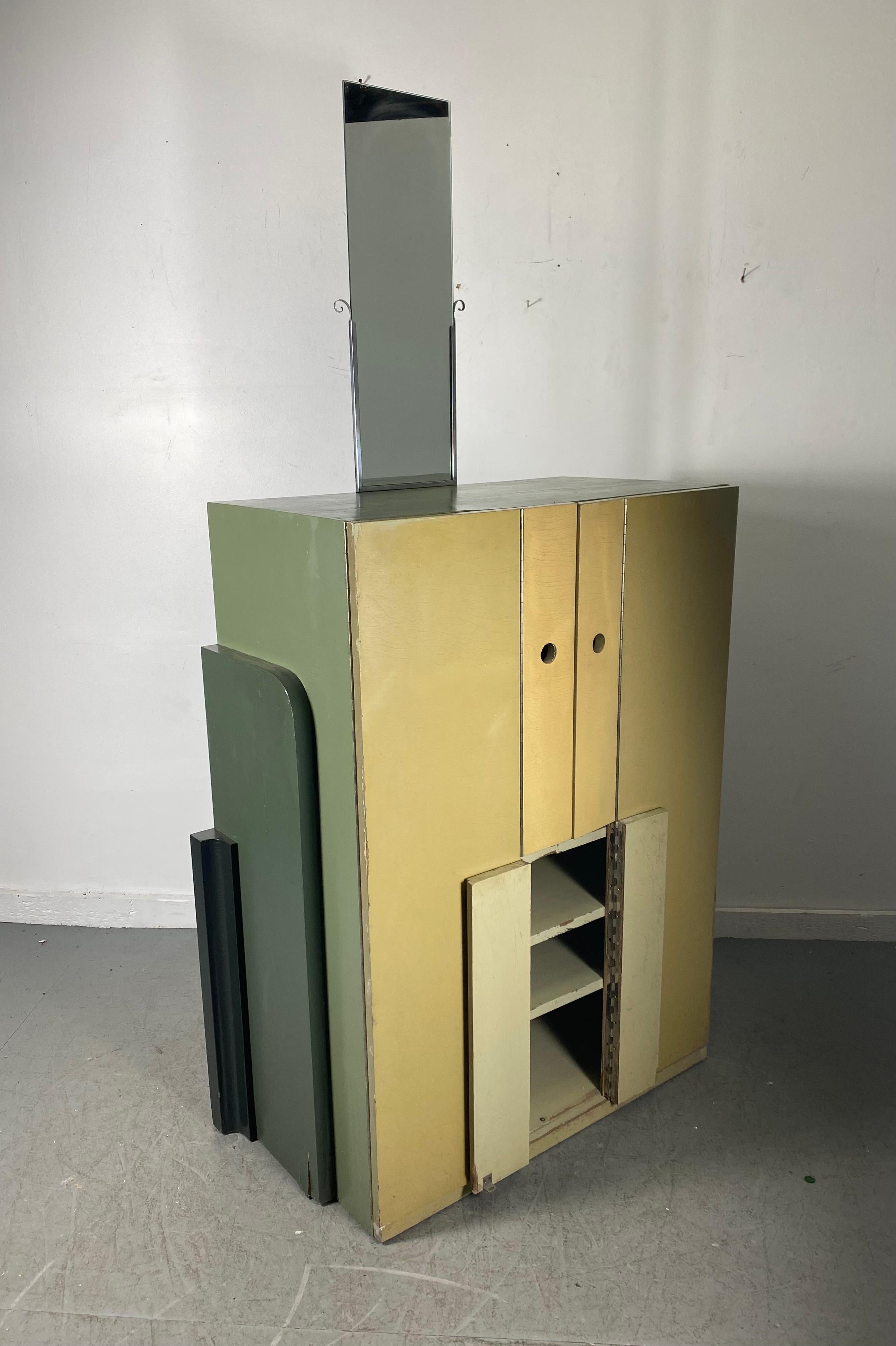 Rare Custom Art Deco, Bauhaus cabinet with removable mirror and ingenious double hinged doors with circular cutout pulls, Designed by architect and designer Jules Buoy, Made for Carlo's Salzedo's Summer Harp Colony in Camden , Maine, Amazing design,
