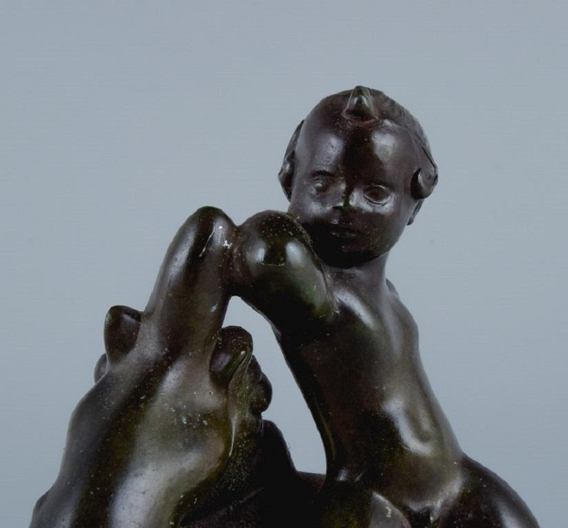 Rare Just Andersen Group Figurine of a Sea Boy and Dragon in Disco Metal, 1940s In Excellent Condition In Copenhagen, DK