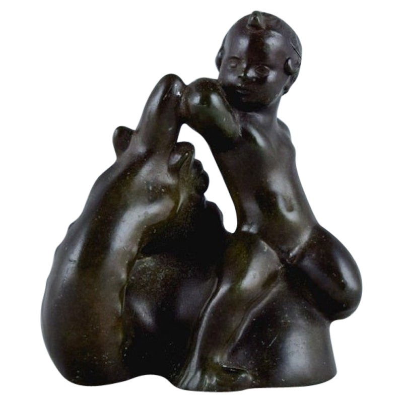 Rare Just Andersen Group Figurine of a Sea Boy and Dragon in Disco Metal, 1940s