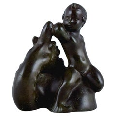 Rare Just Andersen Group Figurine of a Sea Boy and Dragon in Disco Metal, 1940s