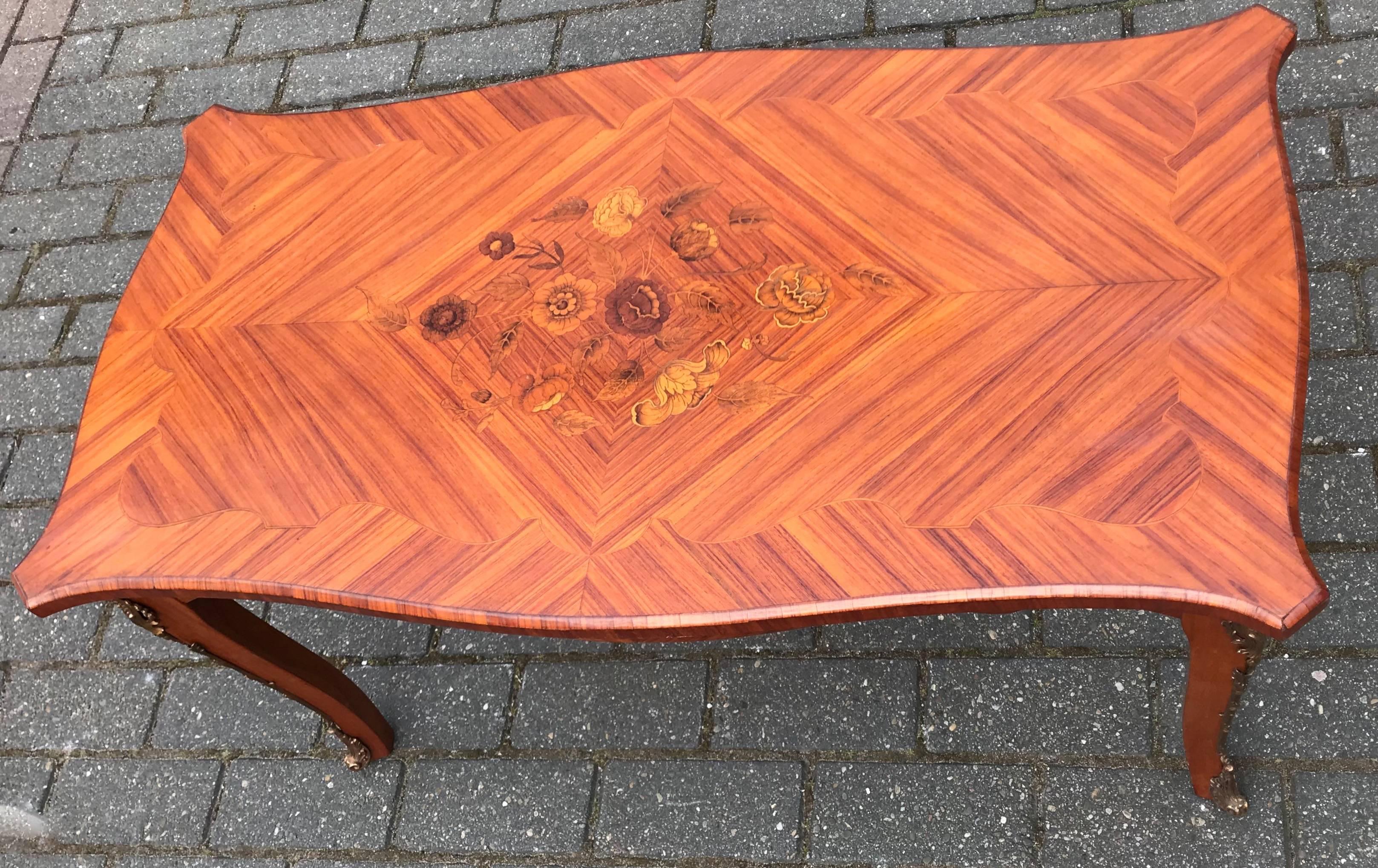 Midcentury quality made, French wooden coffee table .

If you are looking for a stylish, beautifully made and highly decorative coffee table then this French specimen could be just what you want. The Louis Quinze design is perfectly executed with