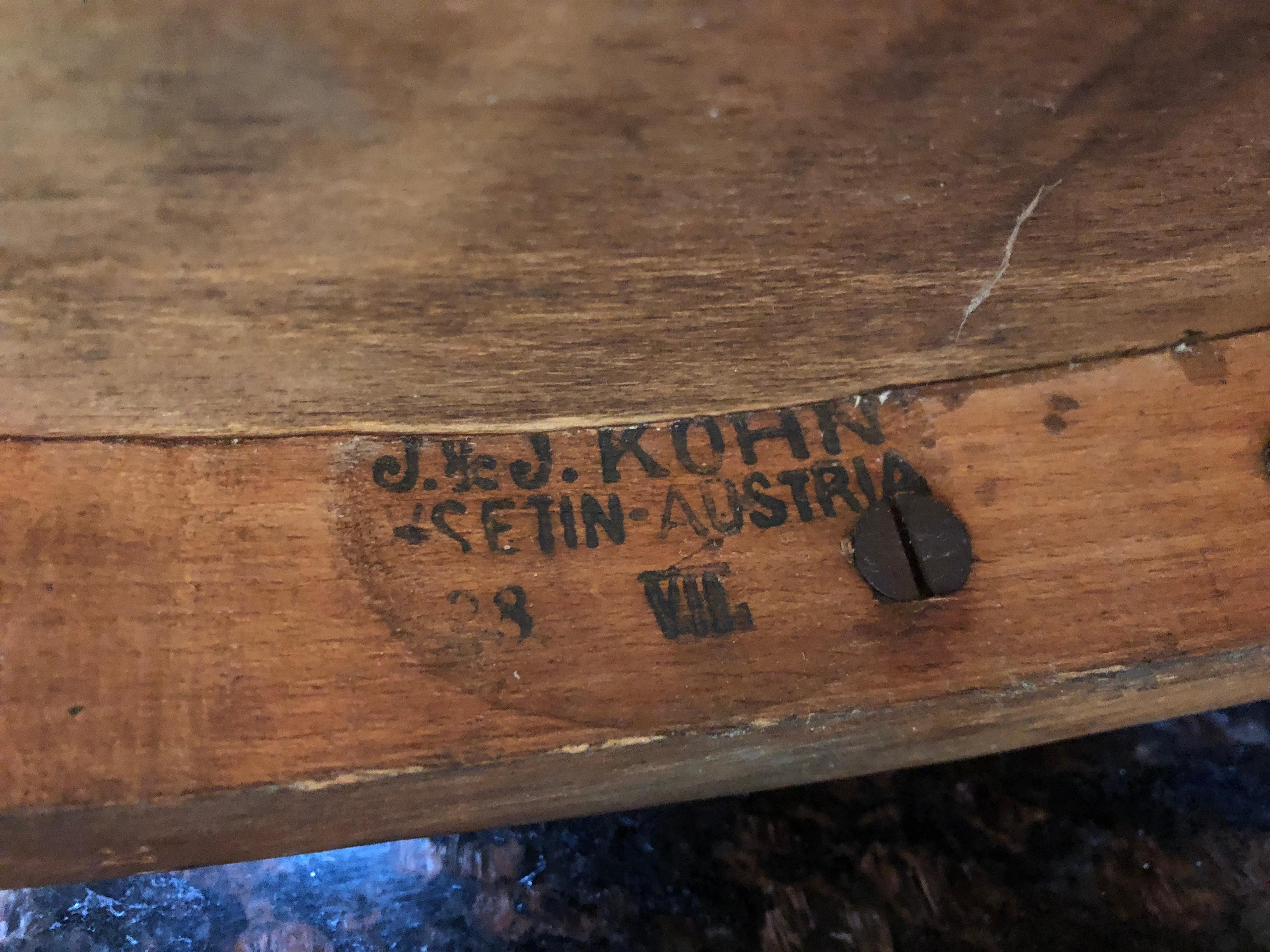 Unusual early Kohn chair paper label Vienna Austria. Unusual chair.

Jacob and Josef Kohn and their descendents influenced Classic furniture design from the Jugendstil and wiener werstatte styles. The Kohn family firm was founded in 1850, as a