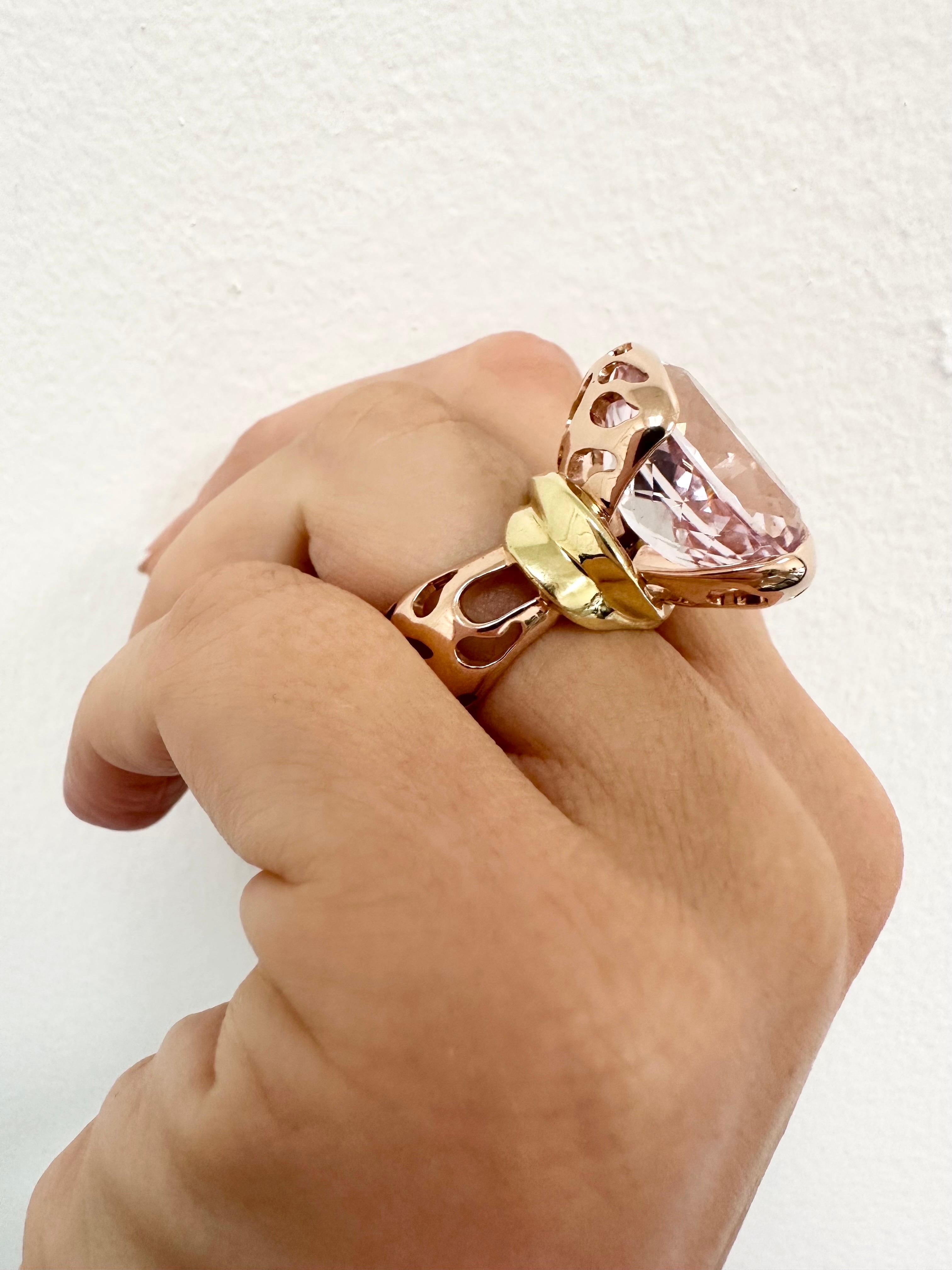 Beautiful cocktail ring with natural pink kunzite in 14KT rose and 18KT yellow gold. Very rare handcrafted piece! It feels as if the designer wanted to make the ring feathery with almost uncovering the center stones beauty from a scarf.

Metal Type: