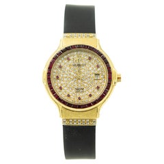 Rare montre-bracelet Hublot pour femme en or 18 carats avec rubis et diamants Réf. 139.10.6