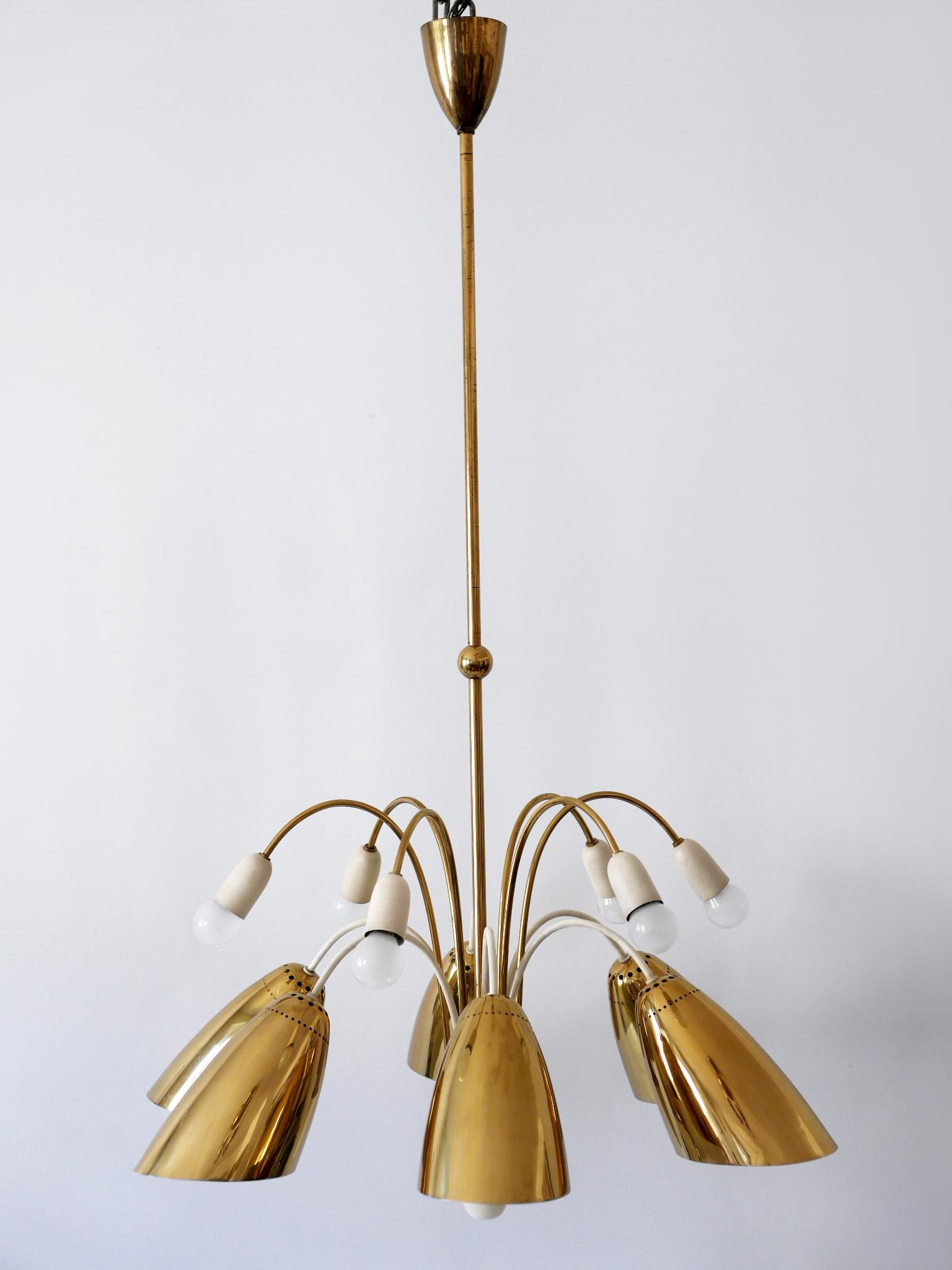Ottone Raro lampadario o lampada a sospensione Sputnik a 12 braccia di Vereinigte Werkstätten in vendita