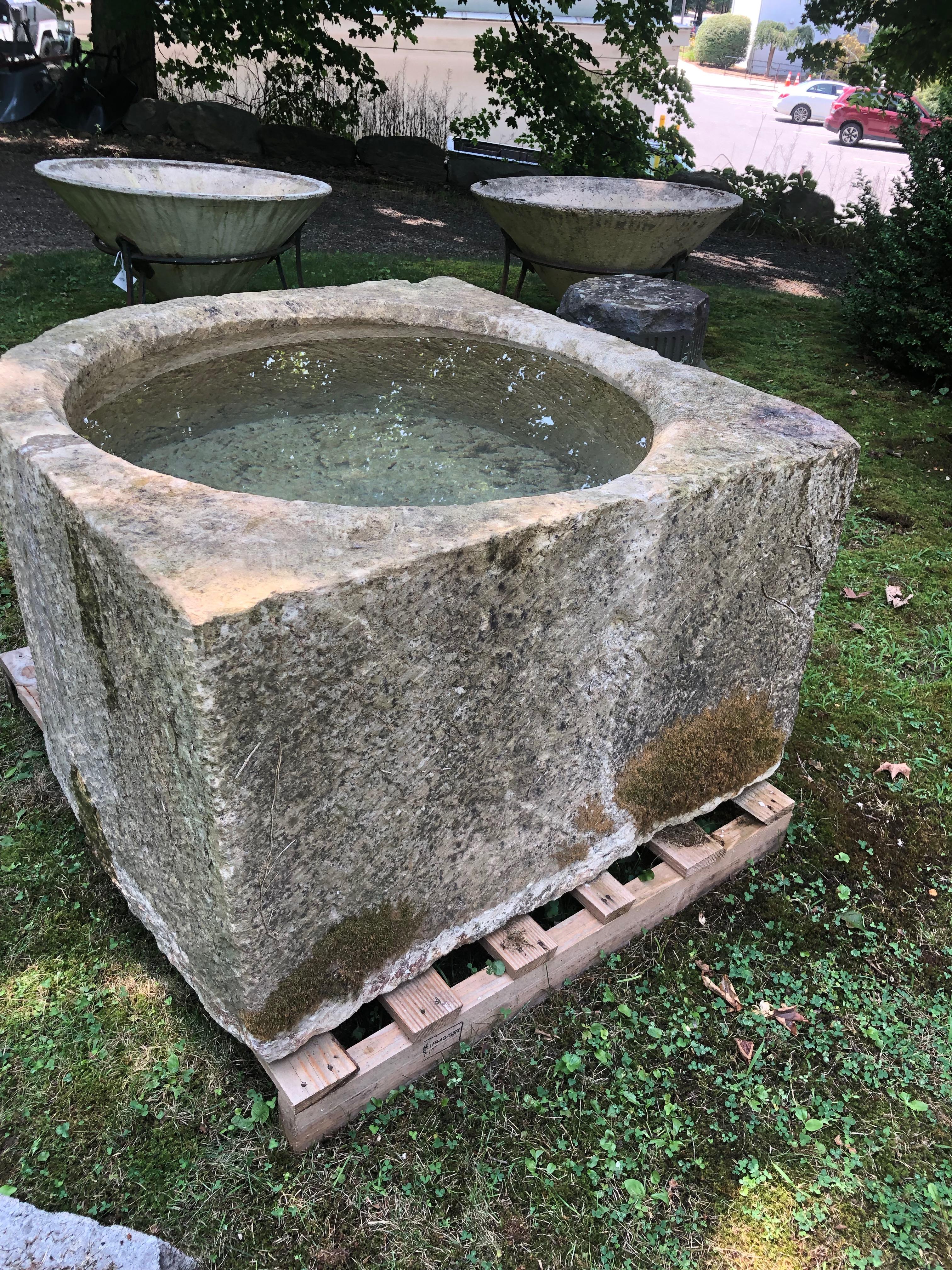Rare Large 17th Century French Hand Carved Limestone Bow-Front Corner Trough In Good Condition In Woodbury, CT