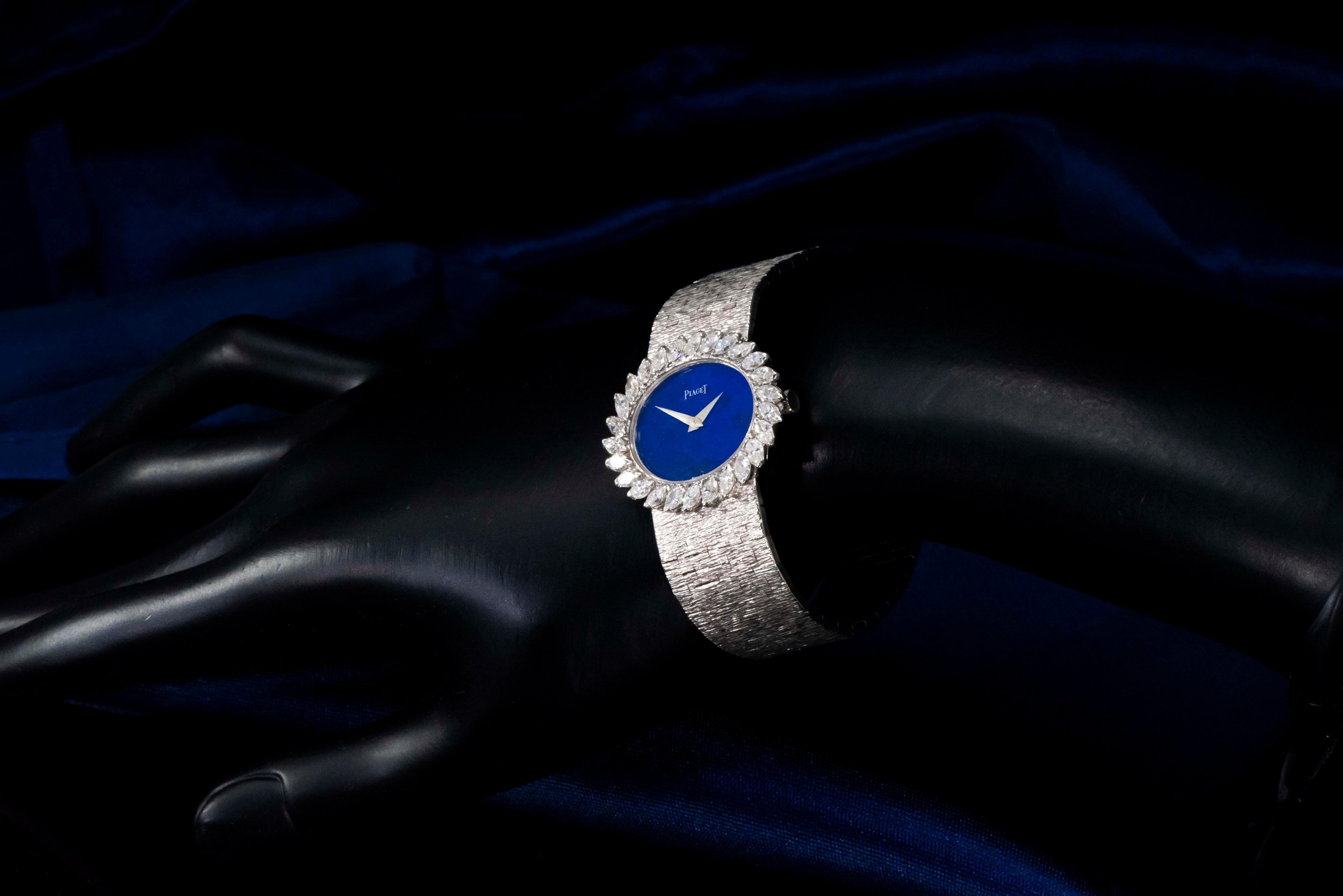 Dimensions
35mm wide across X 34mm Top to bottom
Fits 170mm wrist size 
* Can be resized as complimentary service as needed
Fully Signed Throughout & Recently Serviced



Additional Details 
The present large 1970s 26 Marquise Diamond set Piaget
