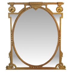 Grand miroir ovale rare compartimenté et doré du 19ème siècle