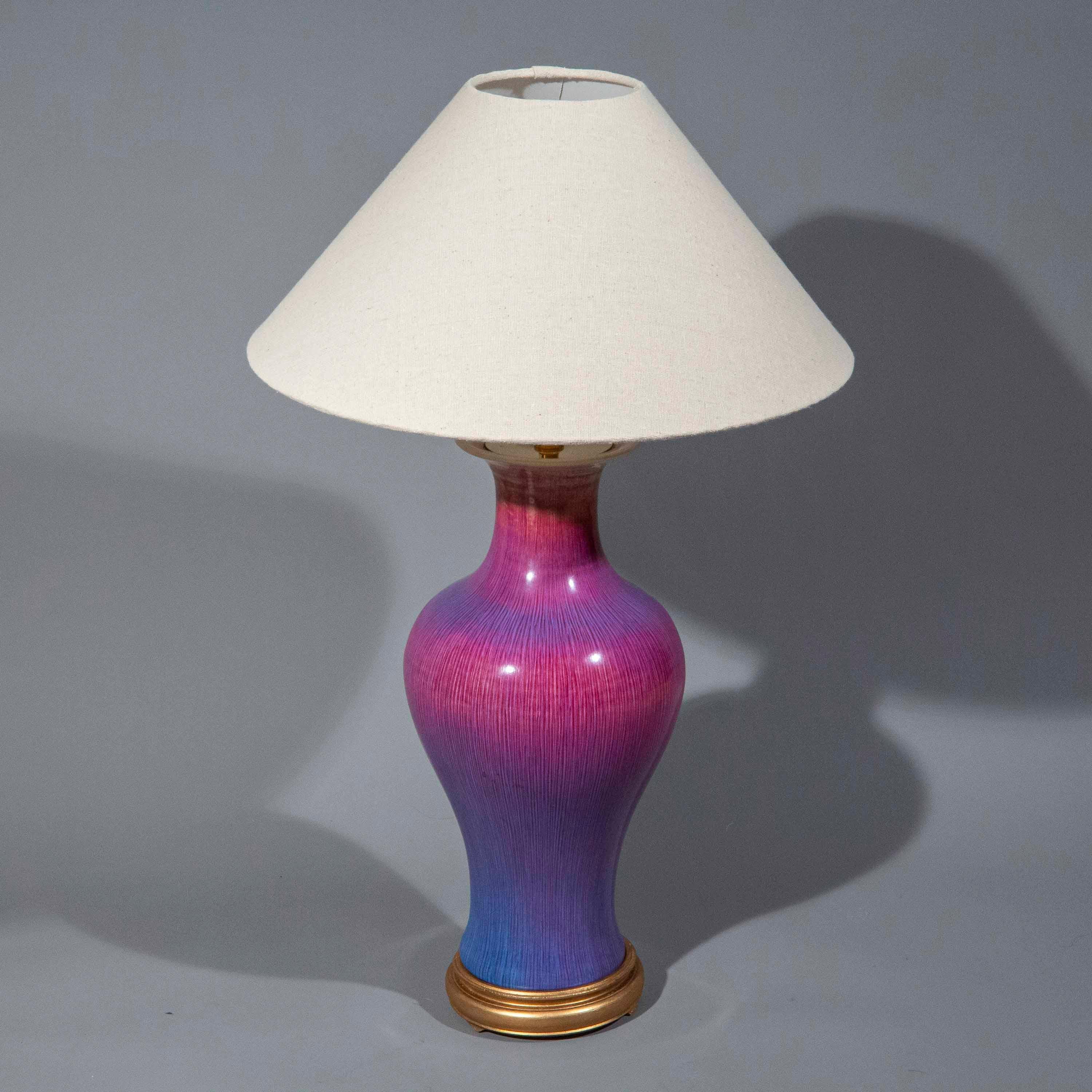 A stunning and extremely rare Chinese export Flambé vase table lamp of superbly decorative colour. Highly sought after design and combination of colours. China, early to mid-20th century. 

Why we like it
We love the rich, decorative effect of the