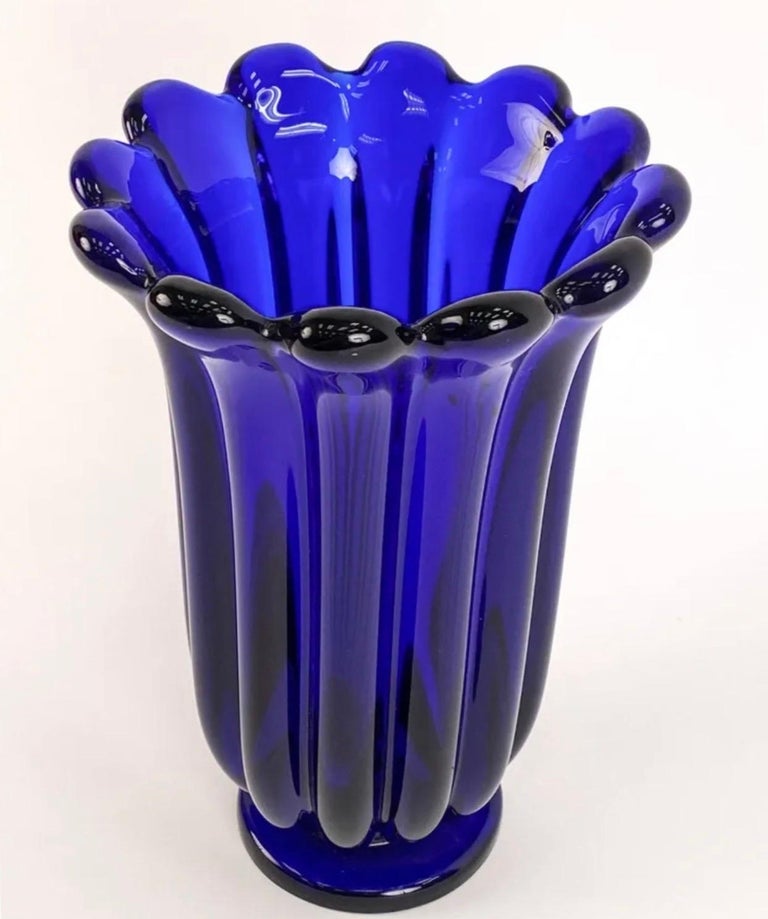 A rare large Art Glass scalloped vase in cobalt blue signed Archimede Seguso Murano Italy
Elegant in form and showing extraordinary craftsmanship.