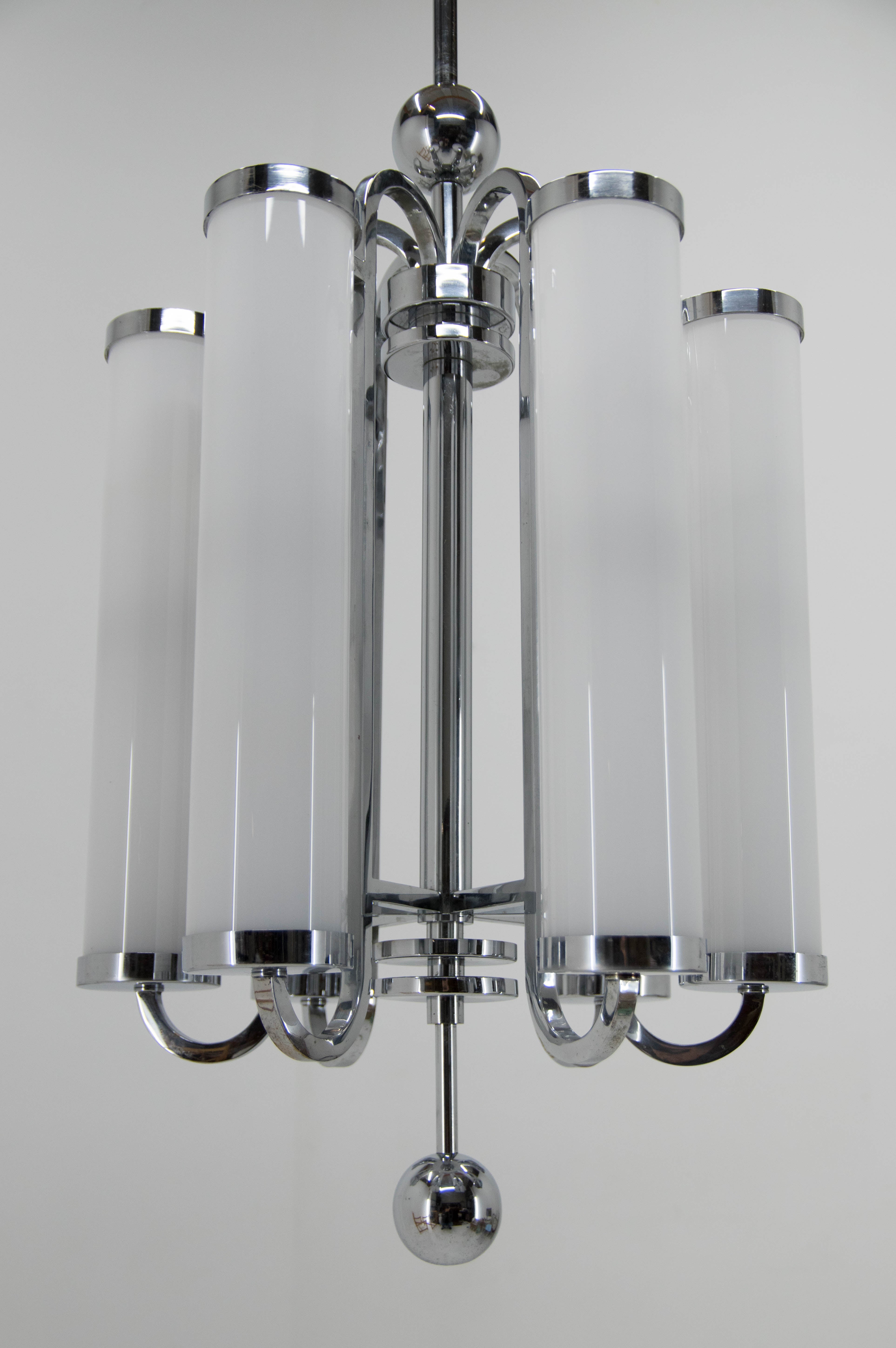 Unique beautiful huge Bauhaus chandelier with two separate circuits - 6+6 40W, E25-E27 bulbs.
Chrome-plating with age patina in a good condition - polished
New hand made blown triplex opaline glass shades in excellent condition, measures: height