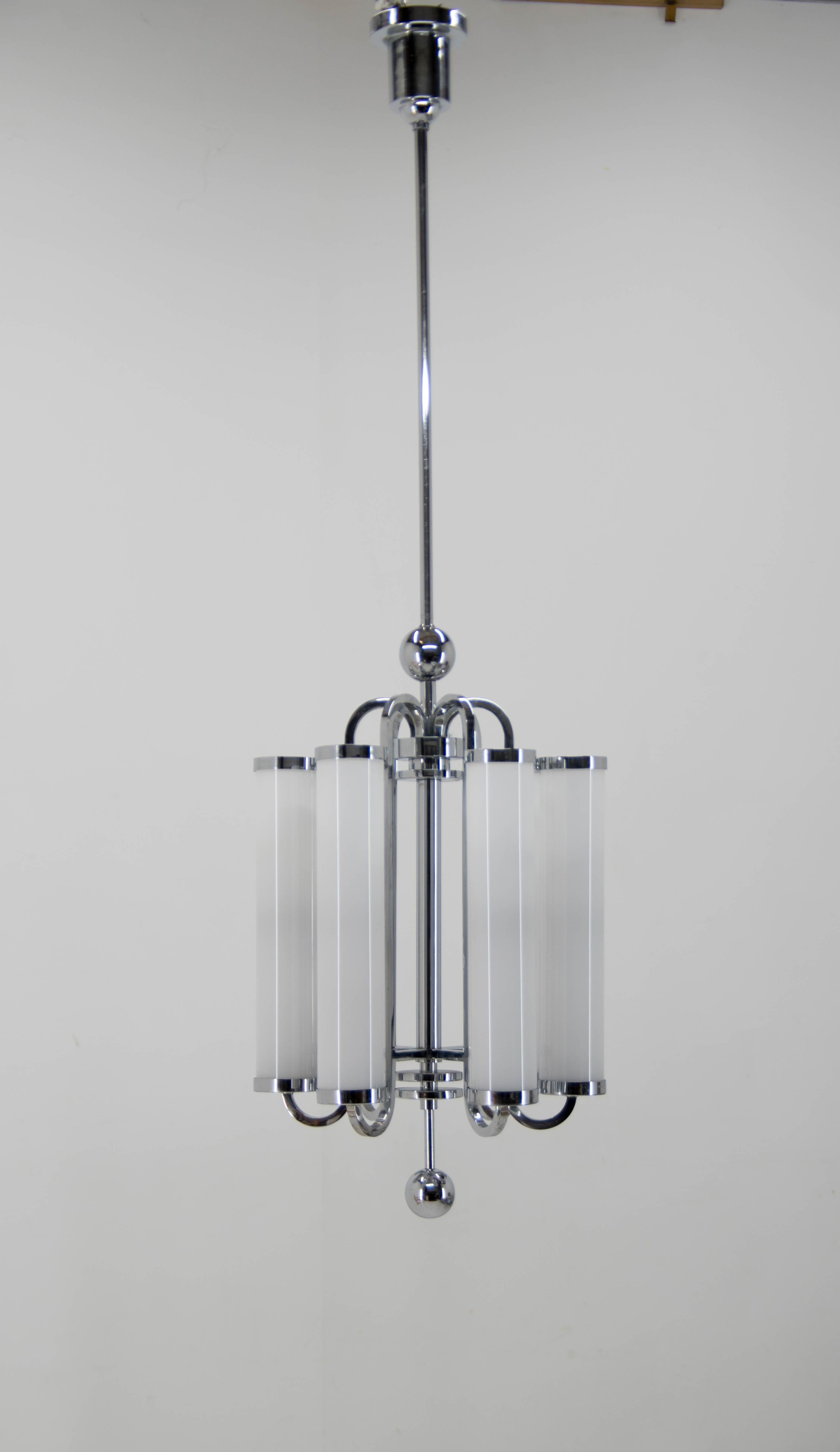 Rare unique beautiful huge Bauhaus chandelier with two separate circuits - 6+6 40W, E25-E27 bulbs.
Chrome-plating with minimum age patina in a good condition - polished
New hand made blown triplex opaline glass shades in excellent condition,