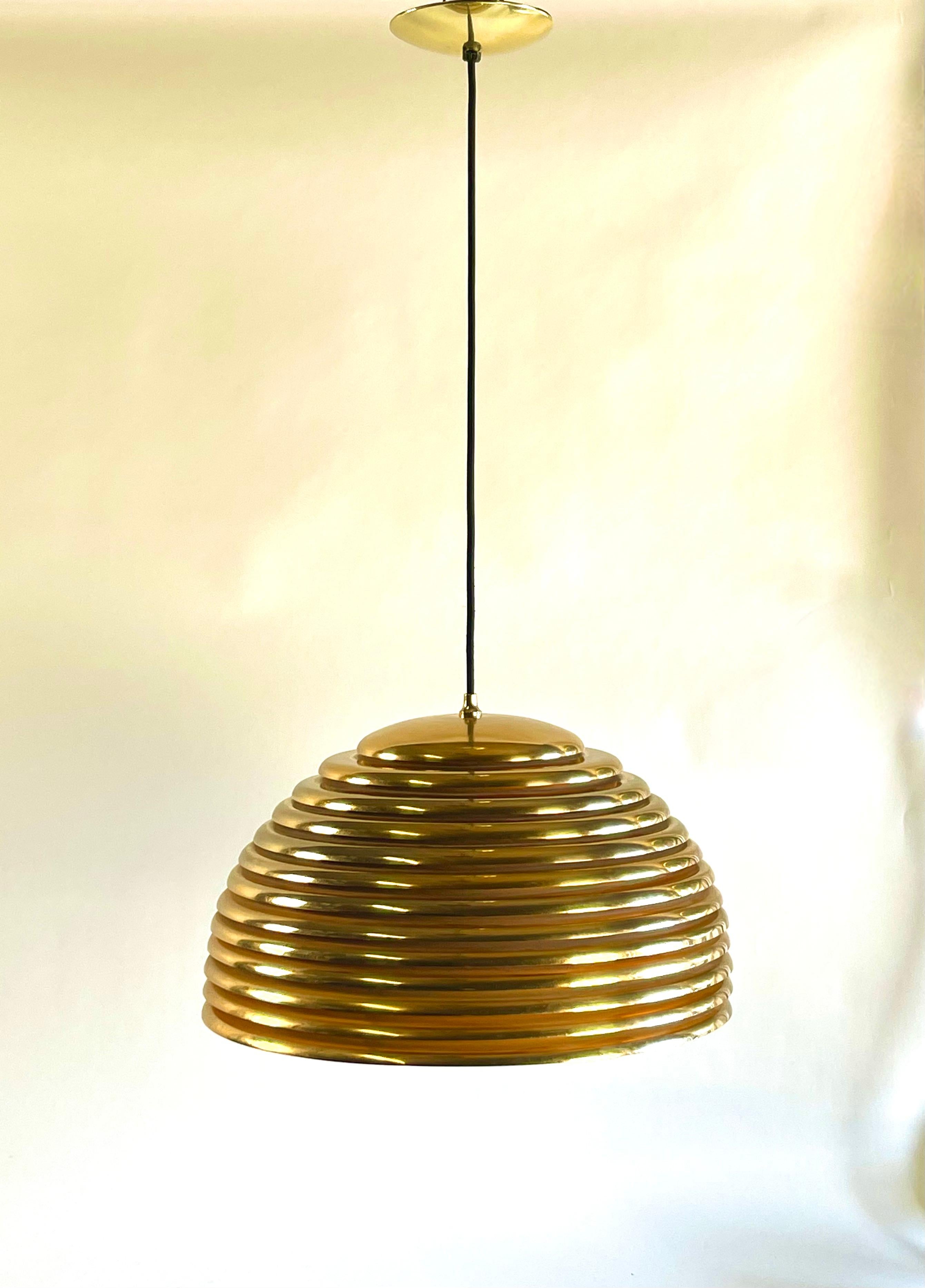 Beautiful and Rare Golden Saturno pendant lamp designed by Kazuo Motozawa early 1970s for Staff. Brass metal construction this is the large version 
Made in Germany

Lamp has been rewired with a 6 ft.
Lamp has four lights inside.


