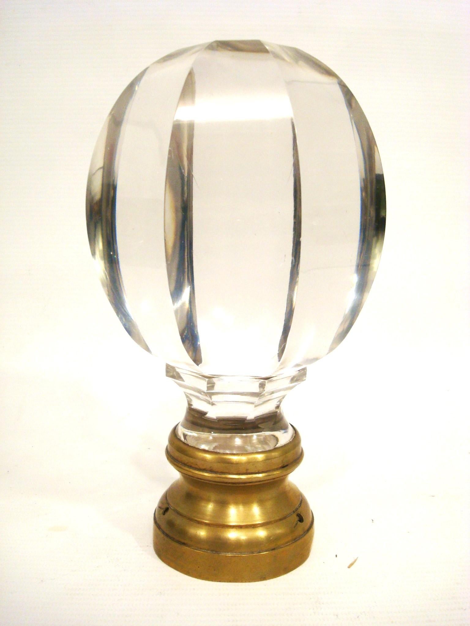 Large French Crystal, Boule d'Escalier Newel Post Finial, Late 19th c. With paneled sides mounted on original brass or bronze base. In Original conditions. Bacarrat Style. No chips nor cracks.


We have specialized in the sale of Art Deco and Art