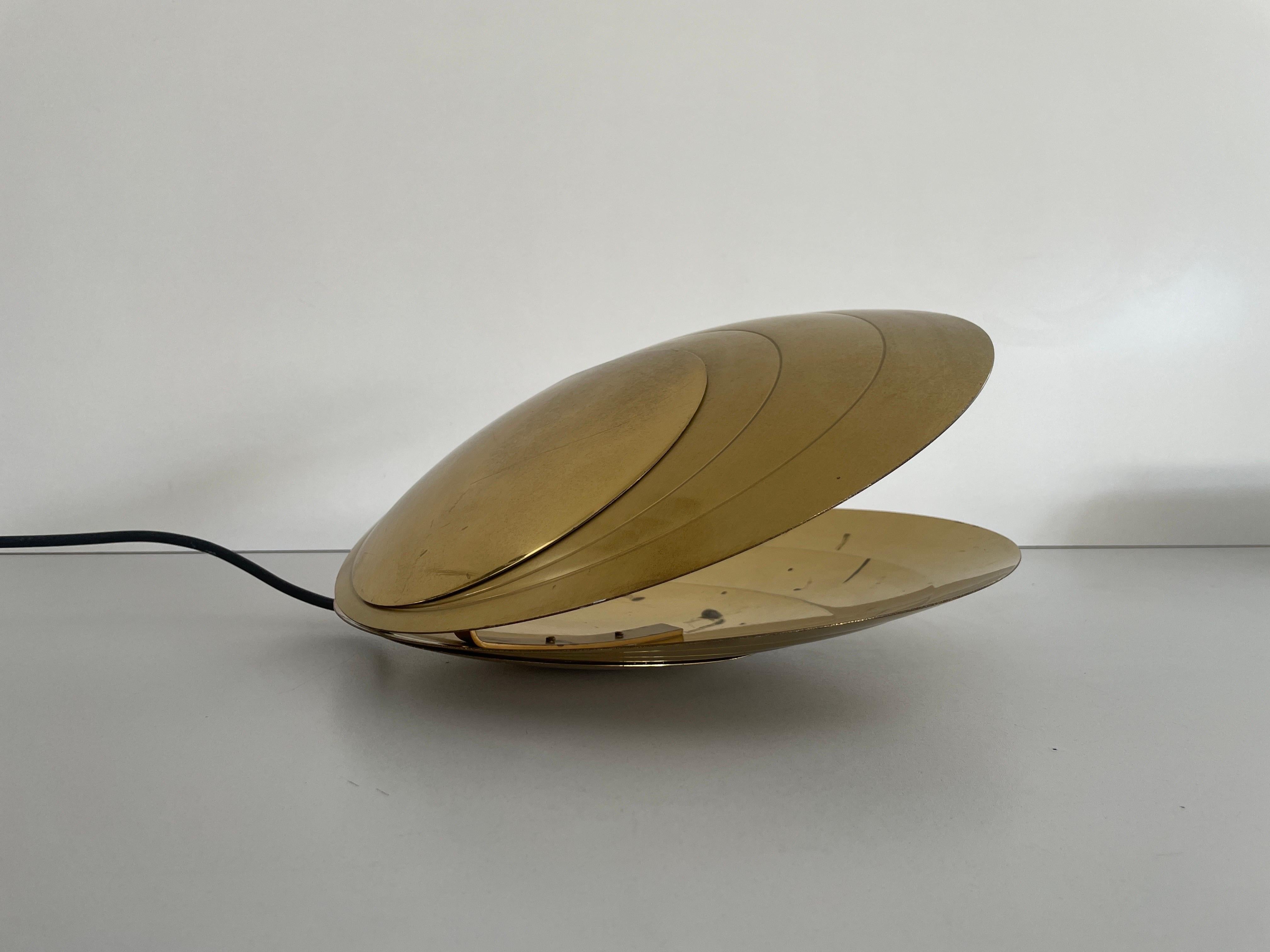 Mid-century Modern Rare Large Clam Shell Design Brass Table Lamp by Angelo Brotto, 1960s, Italy

Lamp is in very good vintage condition.


This lamp works with E27 light bulb. 
Wired and suitable to use with 220V and 110V for all