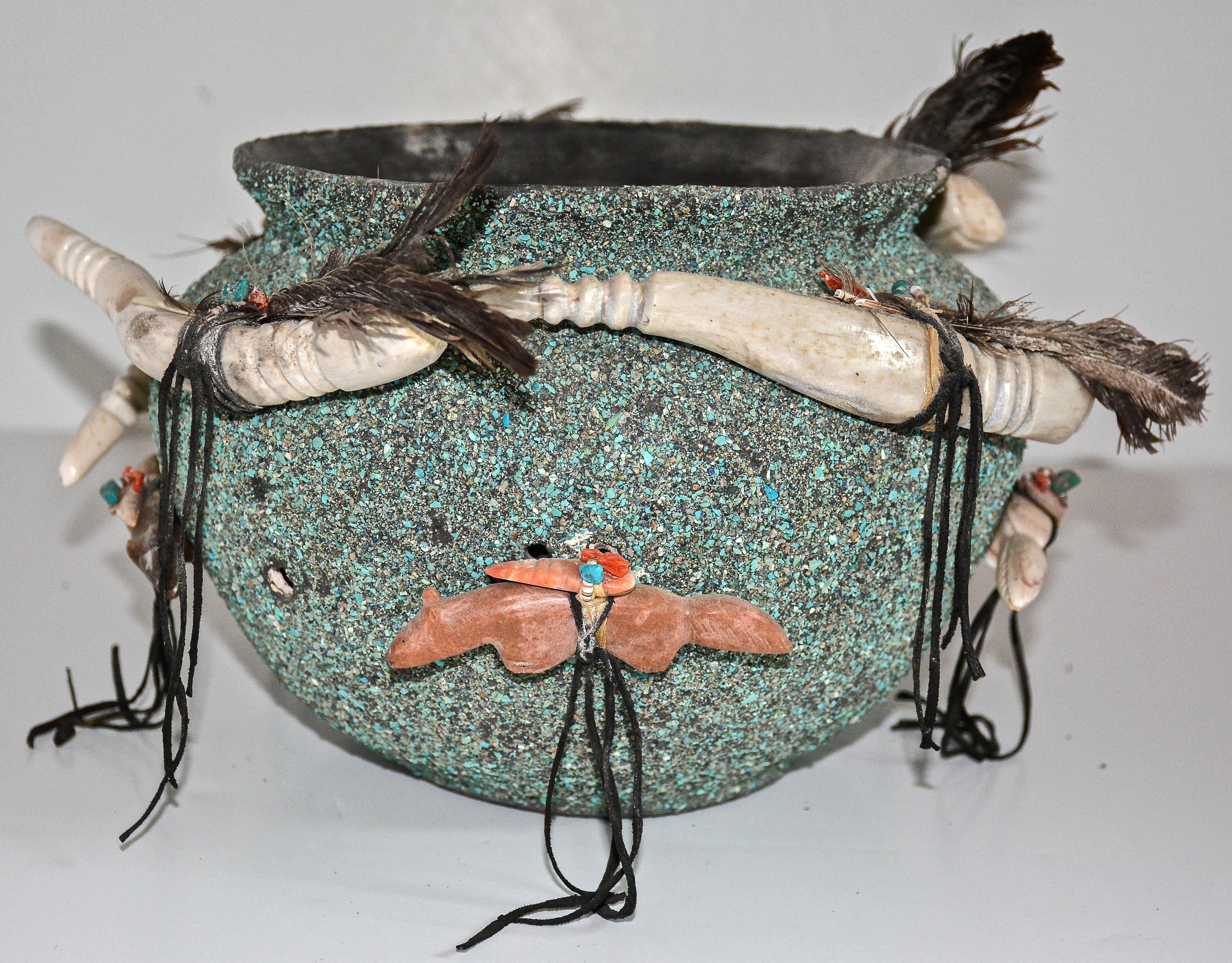 Zuni Fetish Bowl
1976
Edna Weahkee Leki ( 1924 - 2003 )
Ceramic pot, pine tar, turquoise, azurite, serpentine, travertine, alabaster, spiny oyster shell, coral, deer antlers, feathers, deer sinew, leather, cornmeal, ash.

This truly exceptional Edna