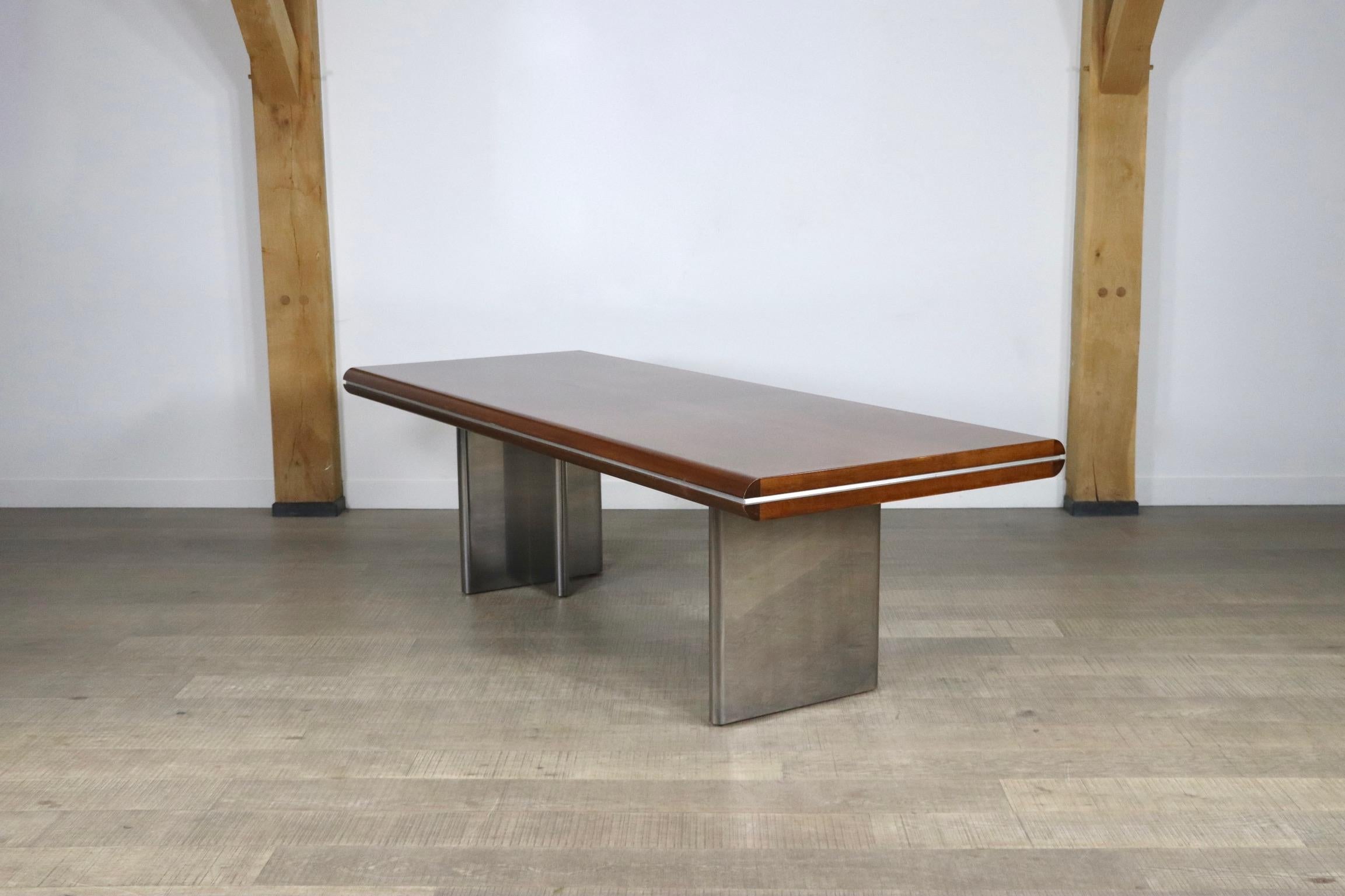 Impressive directors desk designed by Hans von Klier. A striking combination of differently textured materials makes this desk an intriguing piece. This particular model is the largest version of this model, which emphasizes the design even more.