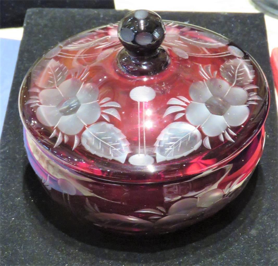 The Following Item we are offering is this Magnificent Large 1920's Bohemian Cranberry Glass Lidded Bowl. Beautifully done with Fine and Intricate Scrolling and with Outstanding Handcut Ornate Accent Detailwork. Glass is of Beautiful Quality. Taken