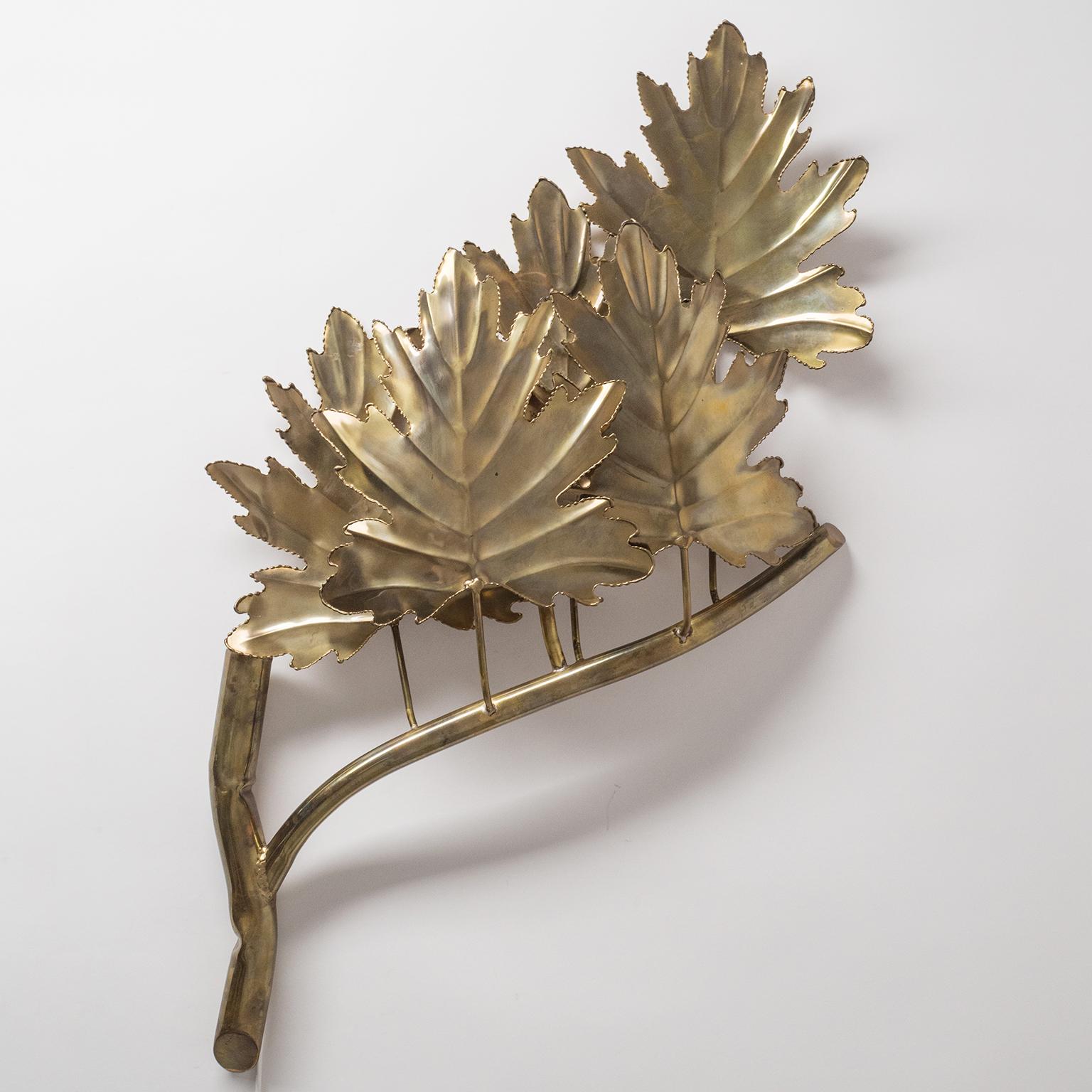 Unique French oversize wall light from the 1970-1980s. Very sculptural piece in the shape of a stylized maple branch with leaves. One brass E27 socket with new wiring.