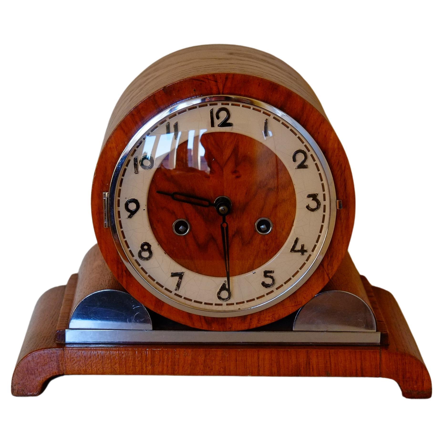 Stunning large Bauhaus mantle clock by Franz Hermle German clock makers. This clock has a stunning large barrel shape over circular shaped feet, made in oak with a walnut clock face. The numbers are a stunning Bauhaus typeface made in enamel on