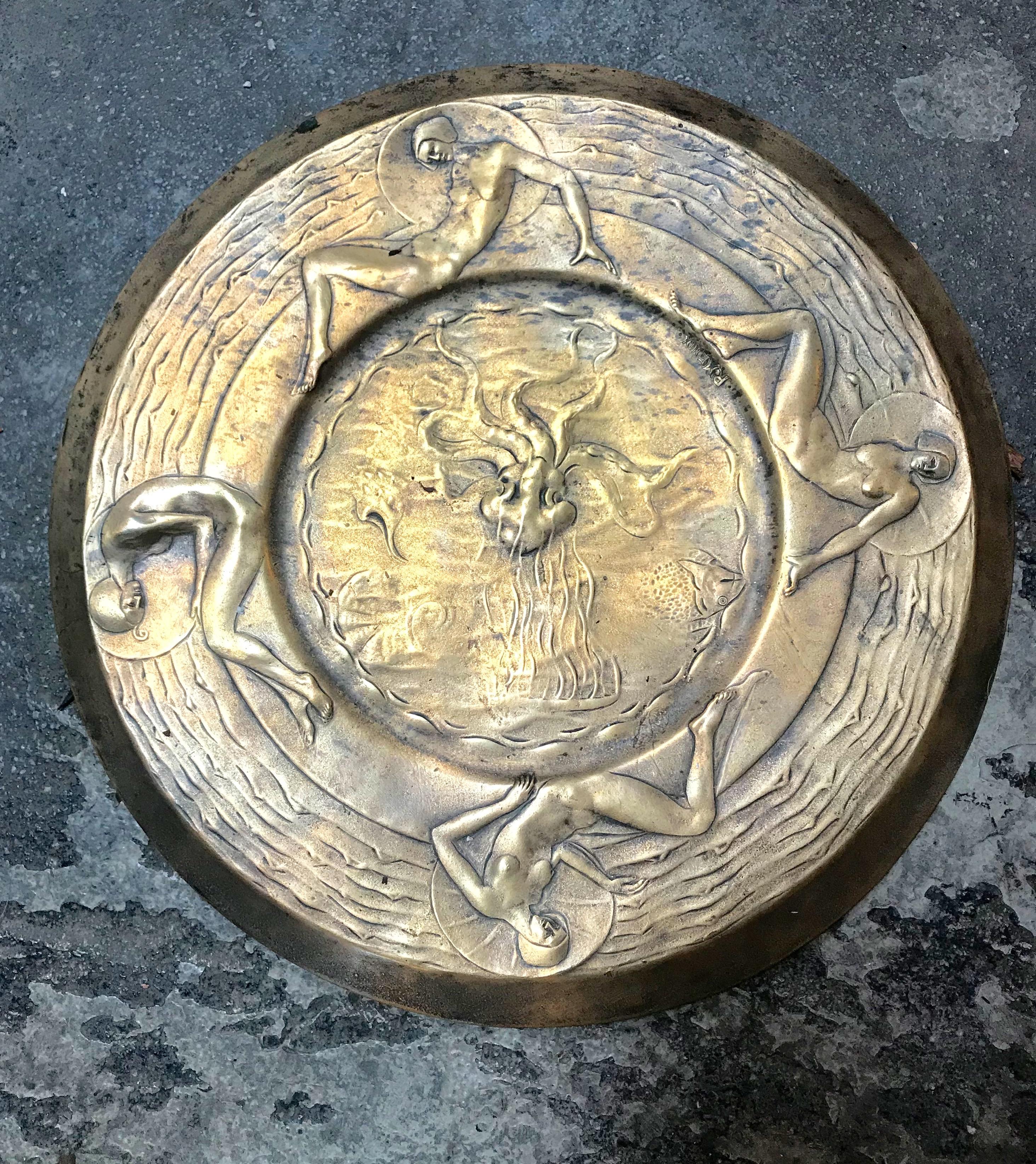 Rare Italian Art Deco handcrafted Medallion signed R.Menon, 1930s
The bronze medallion is in wonderful condition with a pleasant patina all adding to the aged charm and character of the piece.
It has a traditional rounded form, decorated